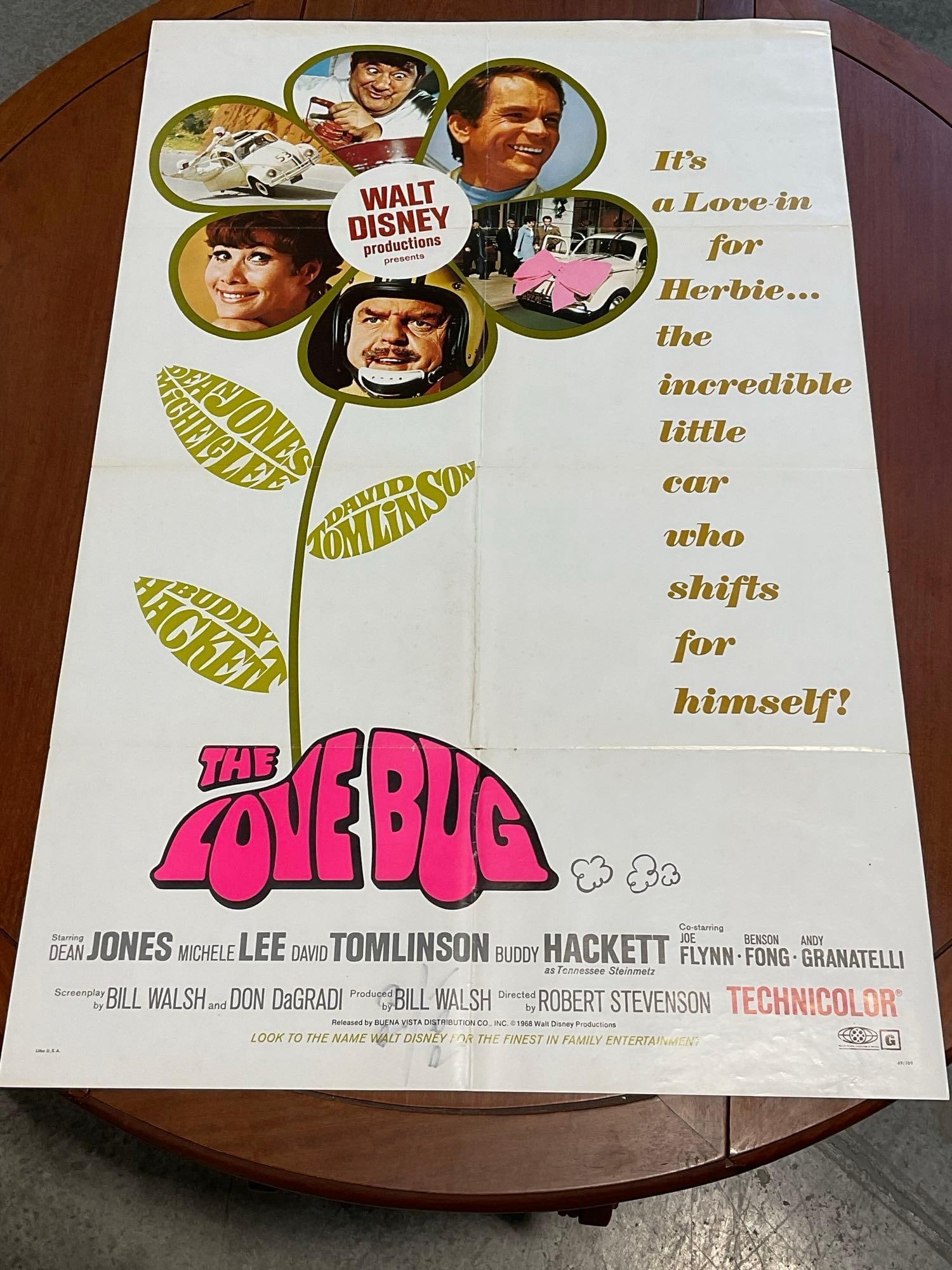 Vintage One Sheet Movie Poster, 1968 The Love Bug, Flower w/Photos in the petals: Marked 69/109. Vintage posters are in as is condition, consistent with age, see pics for condition. Some wear along the fold marks. The poster measures approx 41h x 27w x 1d inches when laid