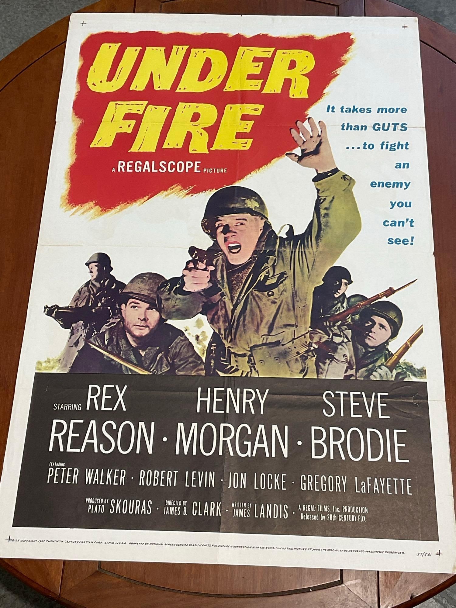 Vintage One Sheet Movie Poster 1957 Under Fire, Rex Reason, Henry Morgan: Marked 57/531. Vintage posters are in as is condition, consistent with age, see pics for condition. Some wear & small tears along the fold marks. The poster measures approx 41h x 27w x