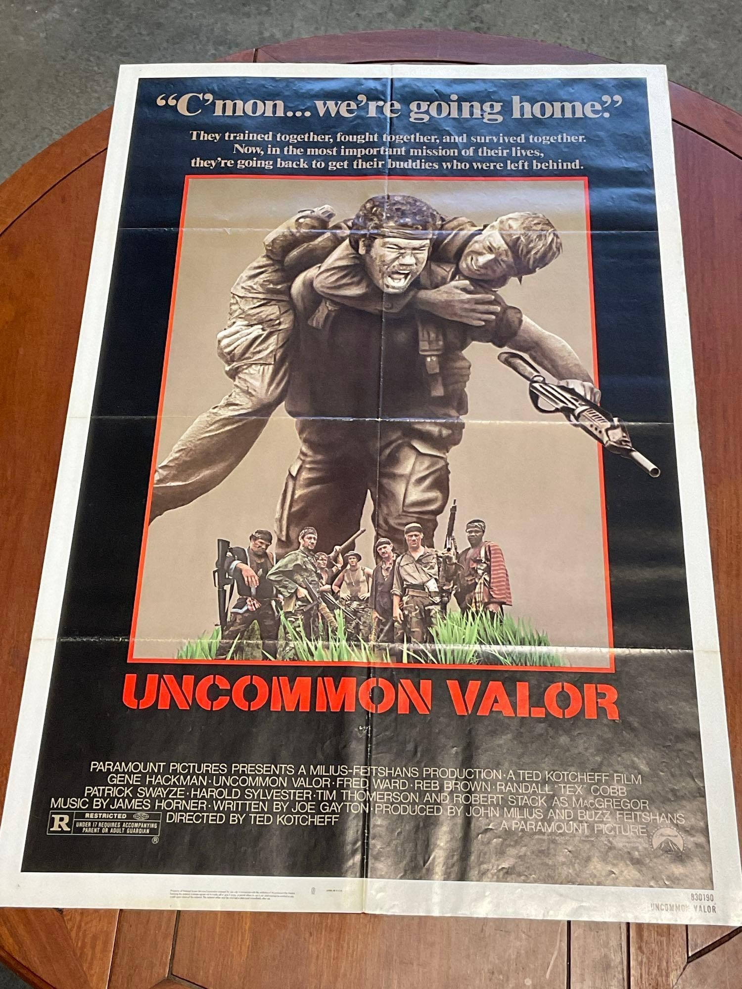 Vintage One Sheet Movie Poster, 1983 Uncommon Valor, Gene Hackman, Patrick Swayze: Vintage posters are in as is condition, consistent with age, see pics for condition. Some wear & some splotches of discoloration along the fold marks. The poster measures approx 41h x 27w x 1