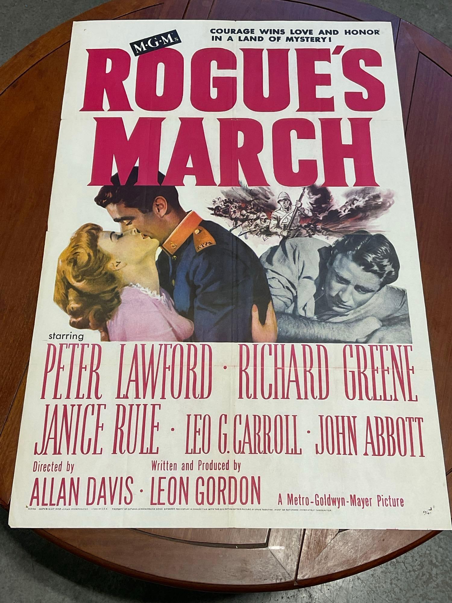 Vintage One Sheet Movie Poster 1953 Rogues March, Large Pink Text, w/photos in the center: Vintage posters are in as is condition, consistent with age, see pics for condition. Some wear along the fold marks. The poster measures approx 41h x 27w x 1d inches when laid flat. E-6640