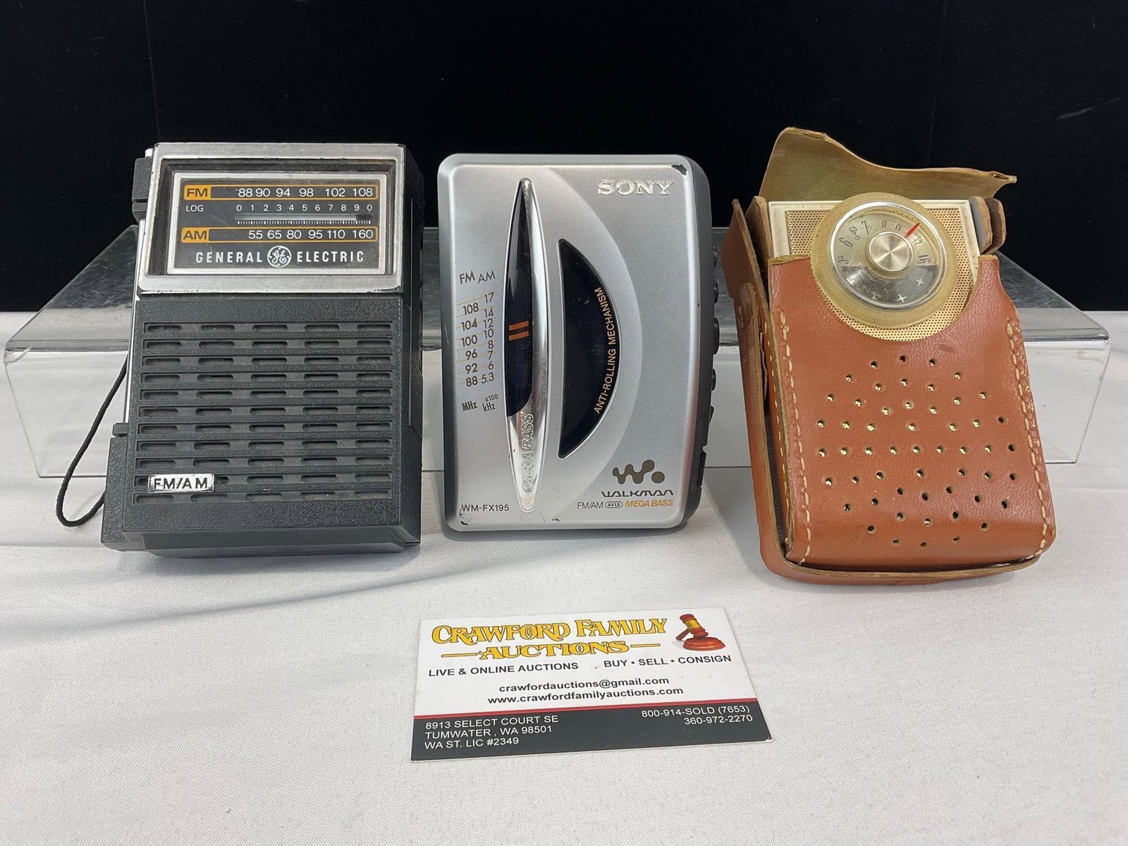 Sony Walkman model WM-FX195 Tape Player, Zenith Royal 60 & GE #7-2506B Portable Radios: Two are untested, The Zenith piece powers on. The piece measures approx 7h x 6w x 5d inches. See pics. E-6610