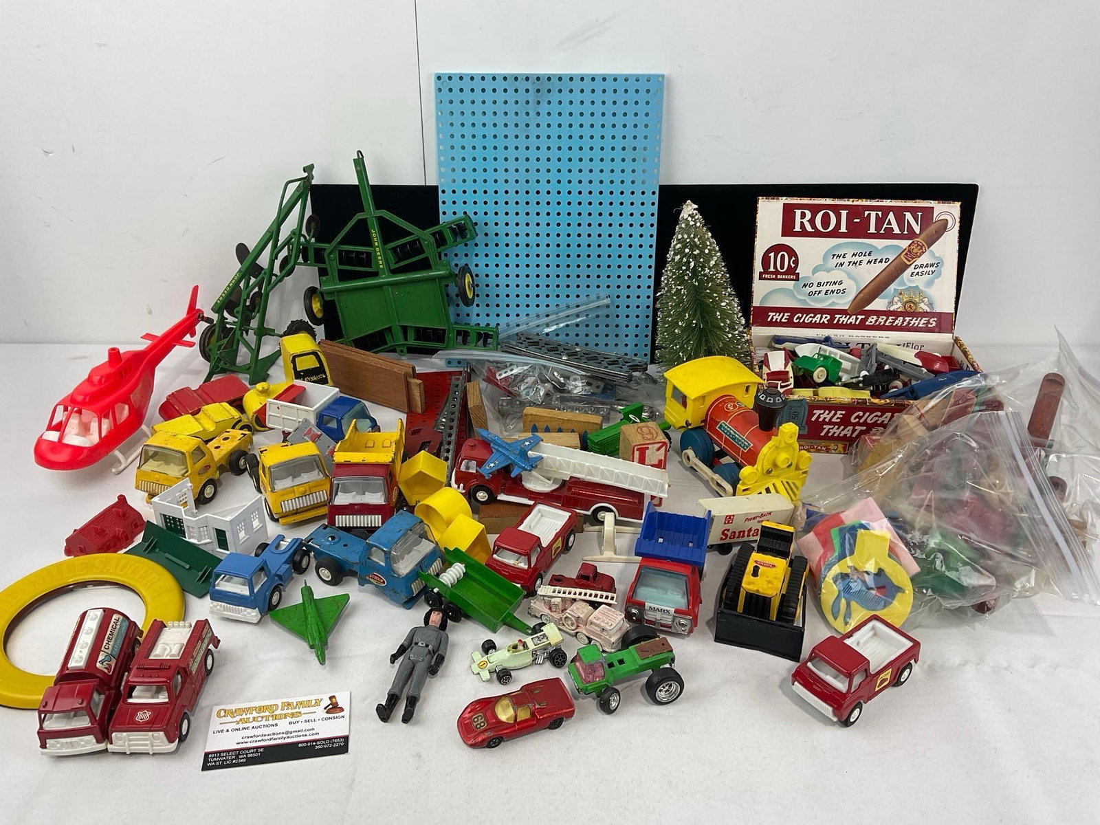 Variety of Diecast Cars, Marx, Tonka & other vintage toys, Erector, Lincoln Logs & more: See pics for condition, many have some finish wear. The piece measures approx 12h x 19w x 14d inches. E-6610