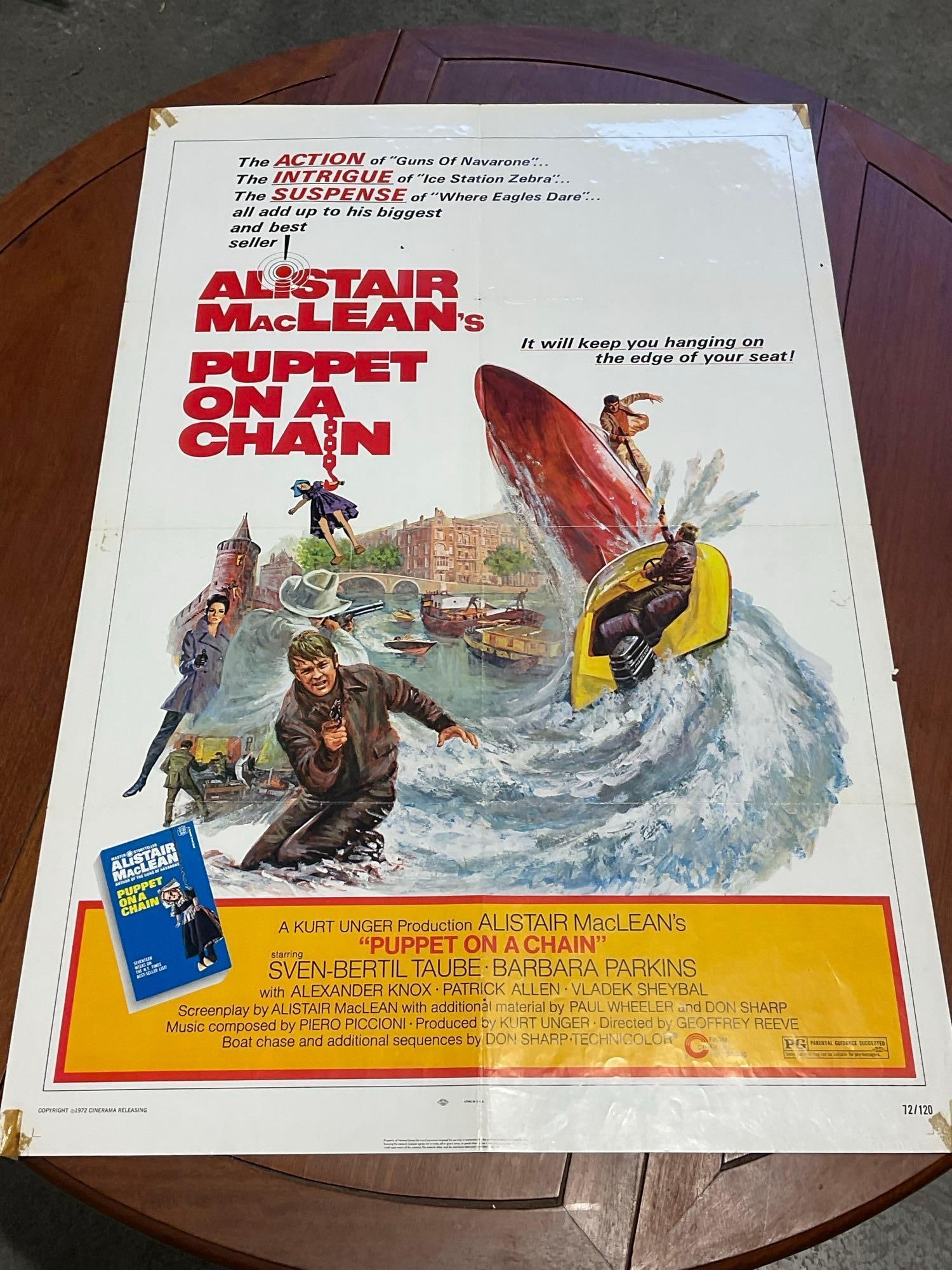 Vintage One Sheet Movie Poster, 1972 Alistair MacLeans Puppet On A Chain: Marked 72/120. Vintage posters are in as is condition, consistent with age, see pics for condition. Some wear along the fold marks. Tape adhesive on each corner. Some small holes. The poster measures