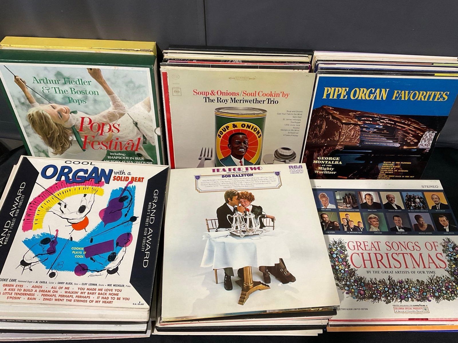Large Selection of Vinyl Records, Hawaiian, Movie Themes, Christmas & more genres, approx 75-100: See pics for condition, some covers show some wear. Measures approx 16h x 31w x 18d inches. E-6610 *Oversized shipping may apply*