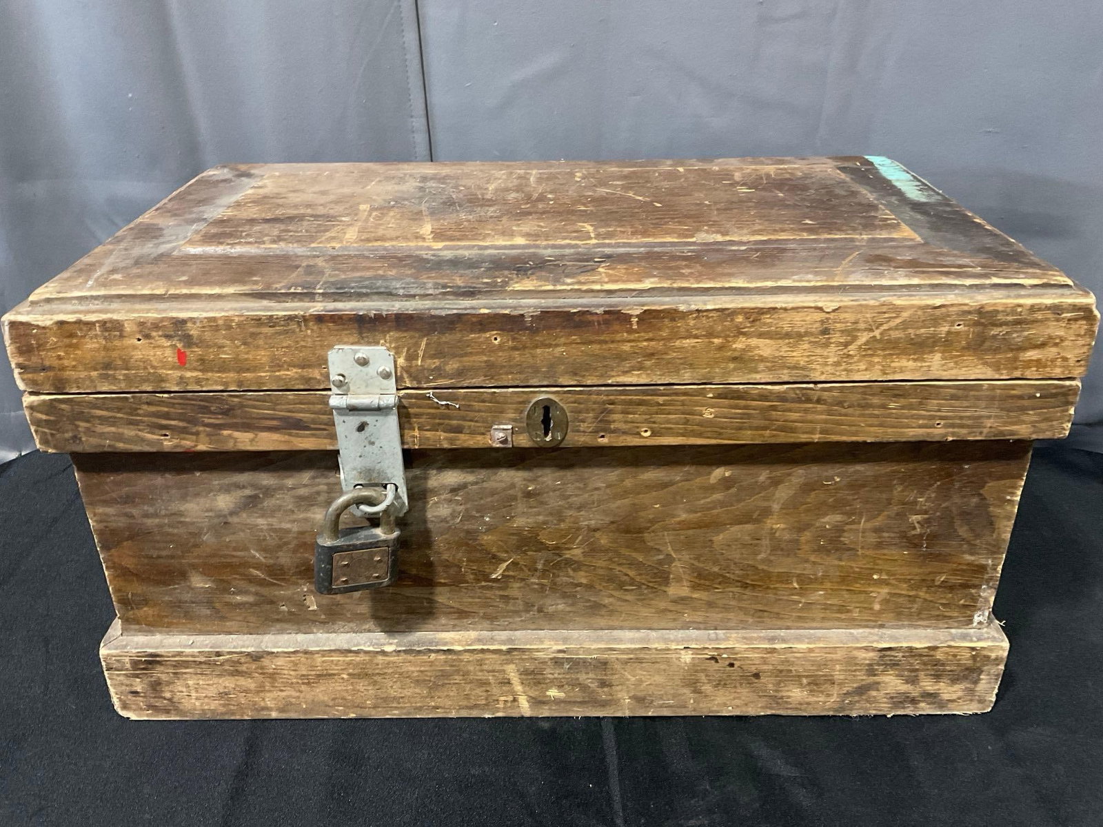 Old Wooden Storage Chest, needs some TLC, no keys, 15h x 26w x 16d inches: See pics for condition. The outside has wear in general. Shows Several scratches, and the hinges on the back are not attached, opens backwards. No Key for the lock on front, or the internal lock of
