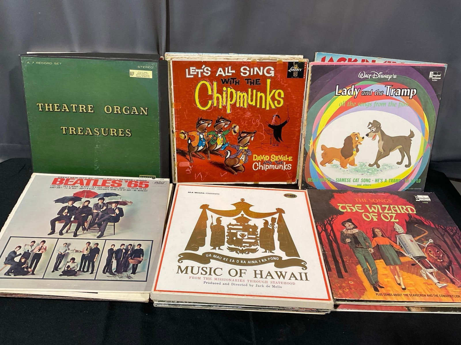 35-40 Vinyl Records, Christmas, Disney, Hawaiian, & more, some cover wear: Shows some cover wear. See pics for condition. Measures approx 9h x 13w x 14d inches. E-6610