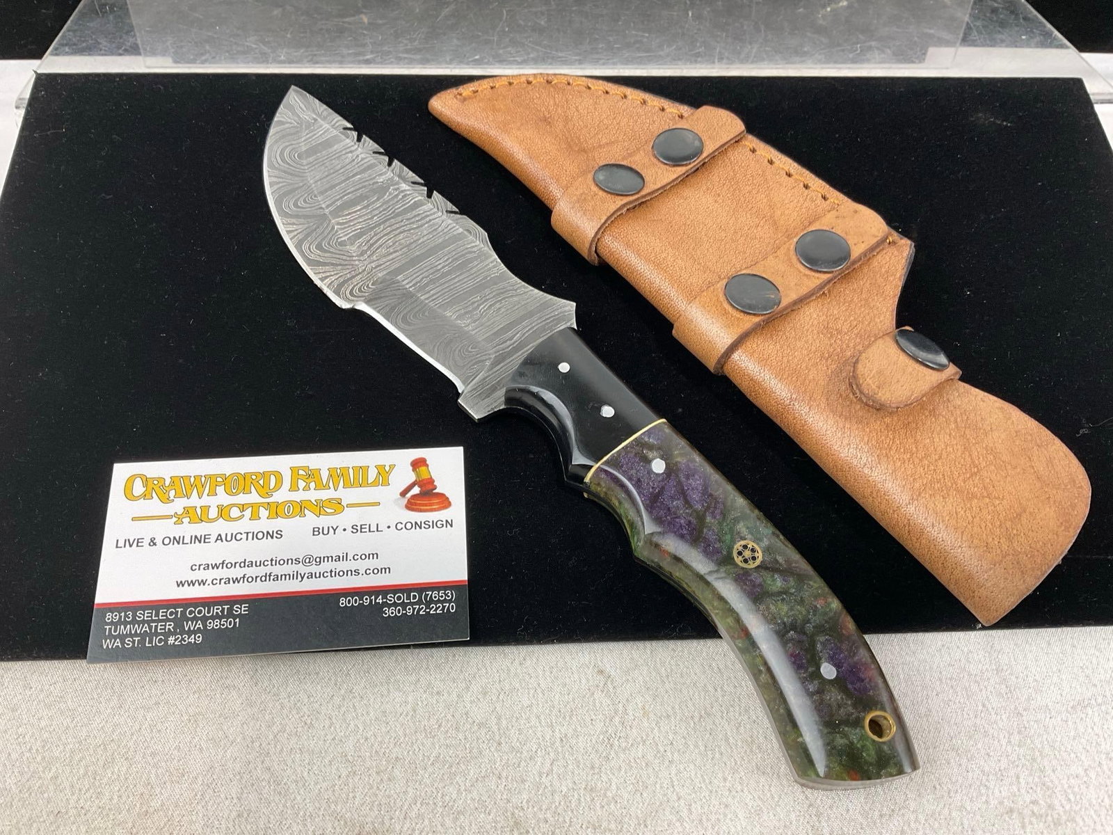 Damascus Blade Knife, 6 inch, Black & Purple Resin Handle w/Leather Sheath: Appears to be in good shape. The blade measures approx 6 inches. In total the piece measures approx 12h x 4w x 3d inches. See pics. E-6500