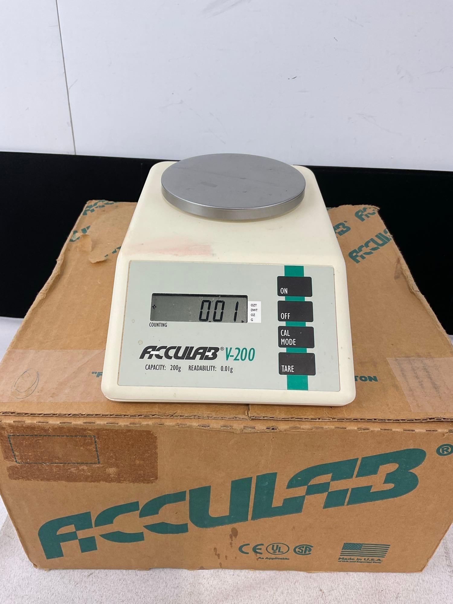 Acculab V-200 Digital Portable Balance Scale, w/9 volt battery, no ac adapter, original box: Appears to be in good shape. The piece measures approx 8h x 12w x 12d inches. See pics. E-6260