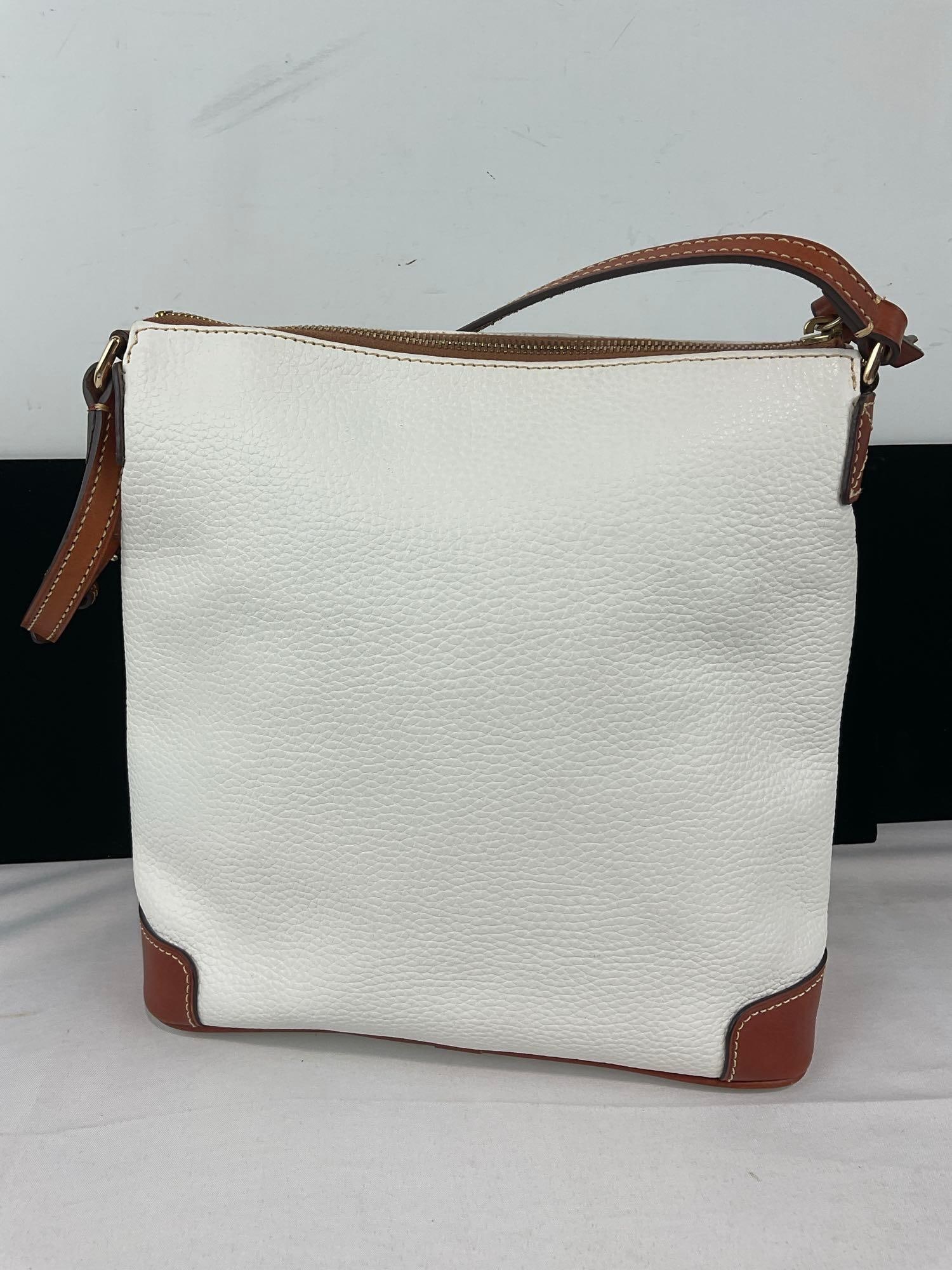 Dooney & Bourke White Pebbled Leather Crossbody Bag, w/Brown Trim, & Bright Red lining - 2