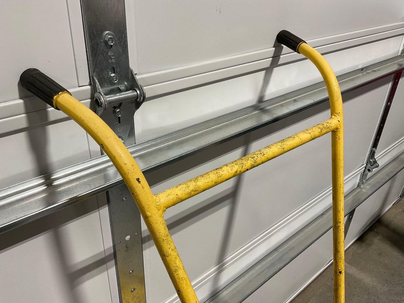 Vintage Push Plow w/metal wheel, Solid Metal, Painted Yellow w/rubber handles - 2