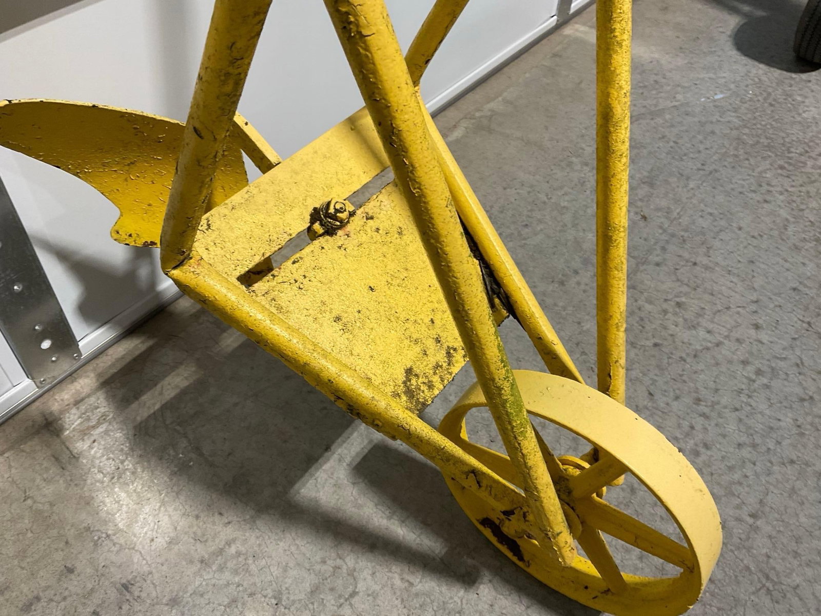 Vintage Push Plow w/metal wheel, Solid Metal, Painted Yellow w/rubber handles - 3