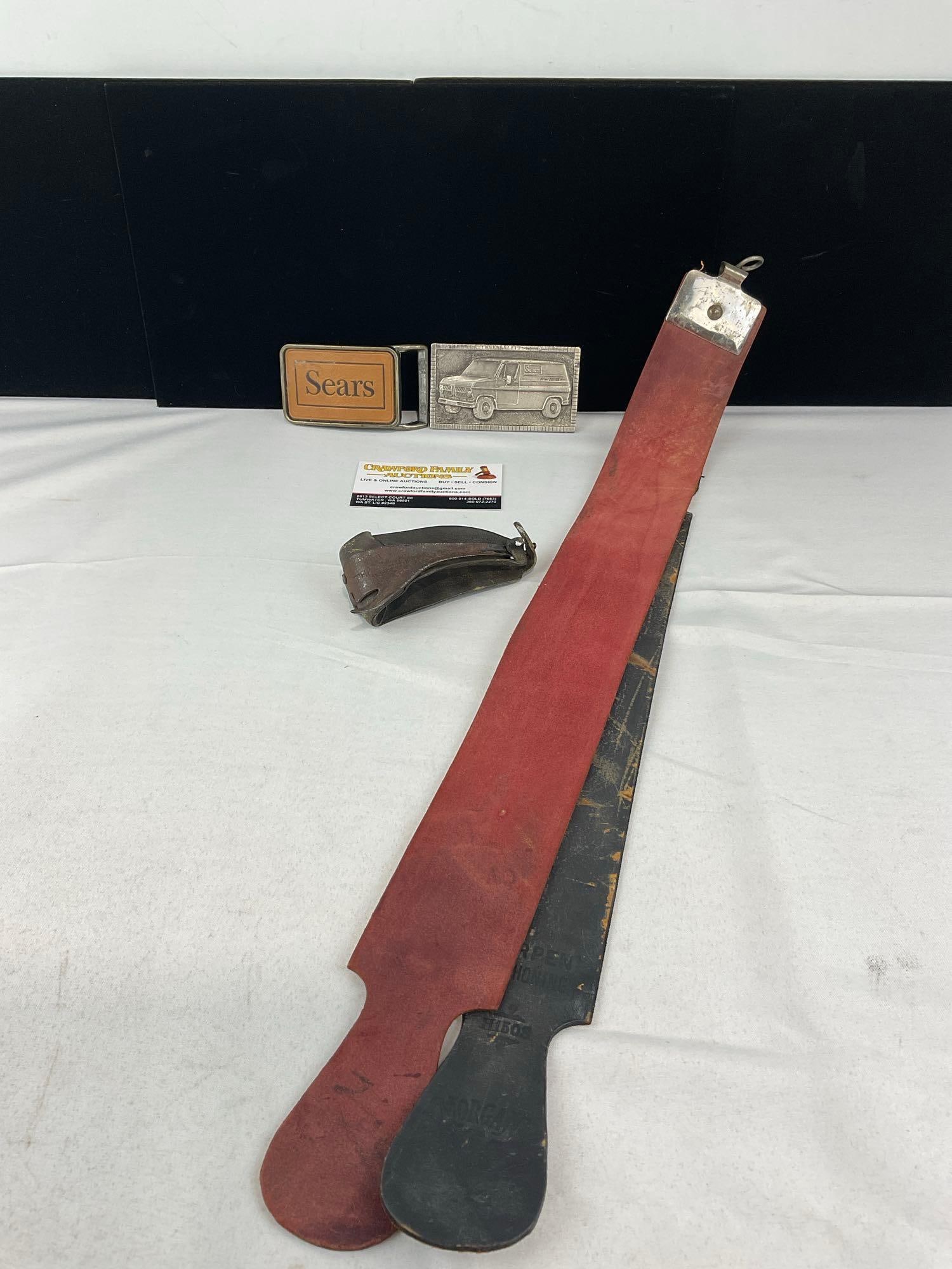 Early 20th Century The Boss Hand-Held Corn Husker, 2x Sears Belt Buckles, & Morgan Leather Strop: The duo leather strop has some wear. See pics for condition. Measures approx 6h x 5w x 4d inches. E-6420