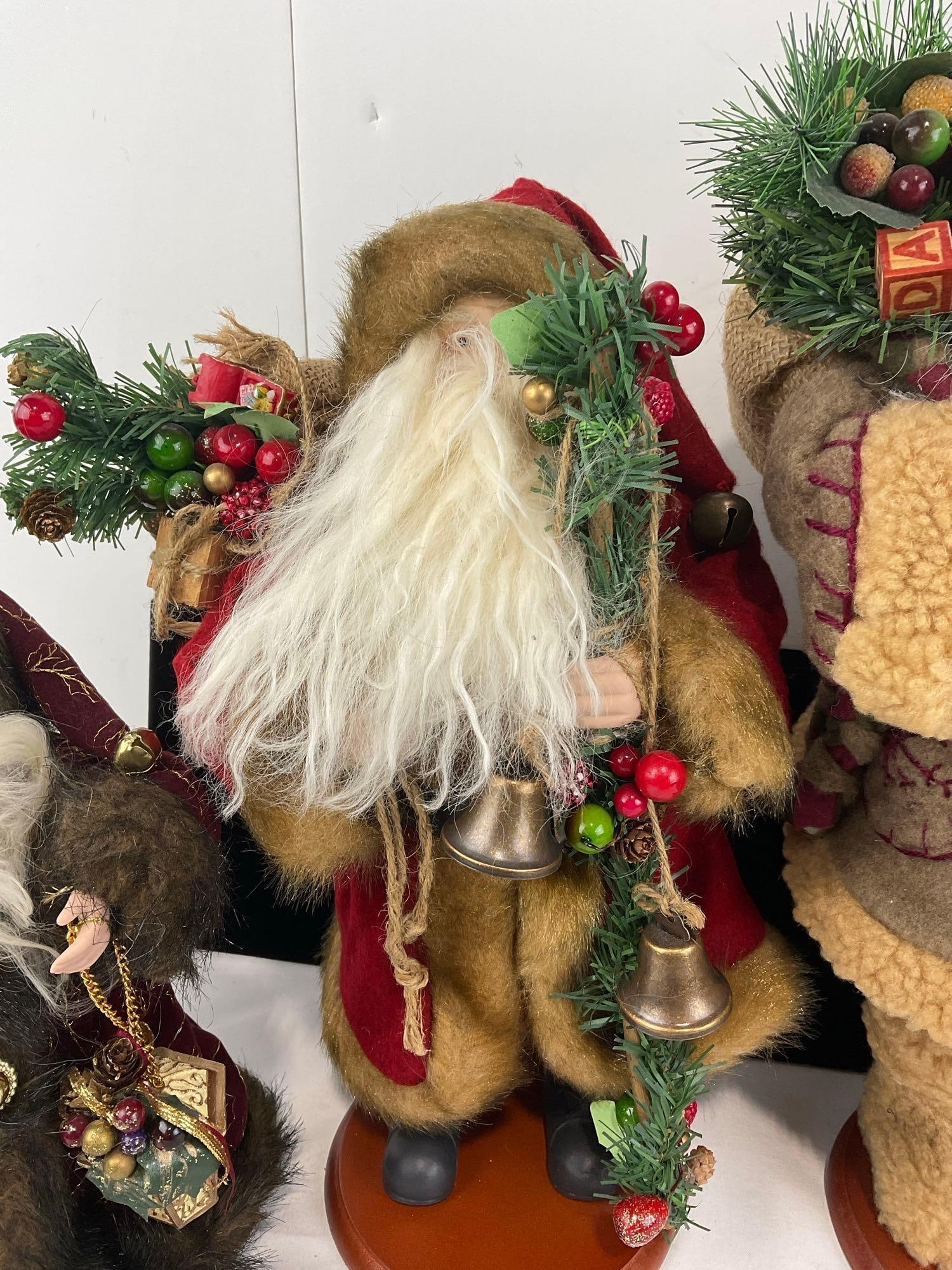 4 Santa Figures, 1 Tree topper, 1 Cloth w/sand in bottom & 2x Holiday Home - 3