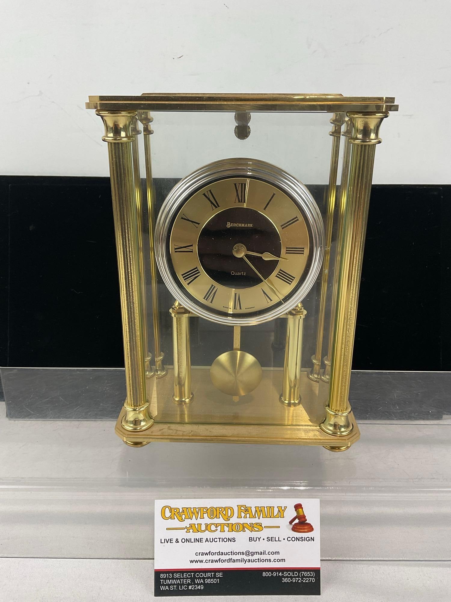 Benchmark Skeleton Quartz Brass & Glass Clock, made in Germany, 9x7x4 inches: See pics for condition. Measures approx 9h x 7w x 4d inches. E-6620