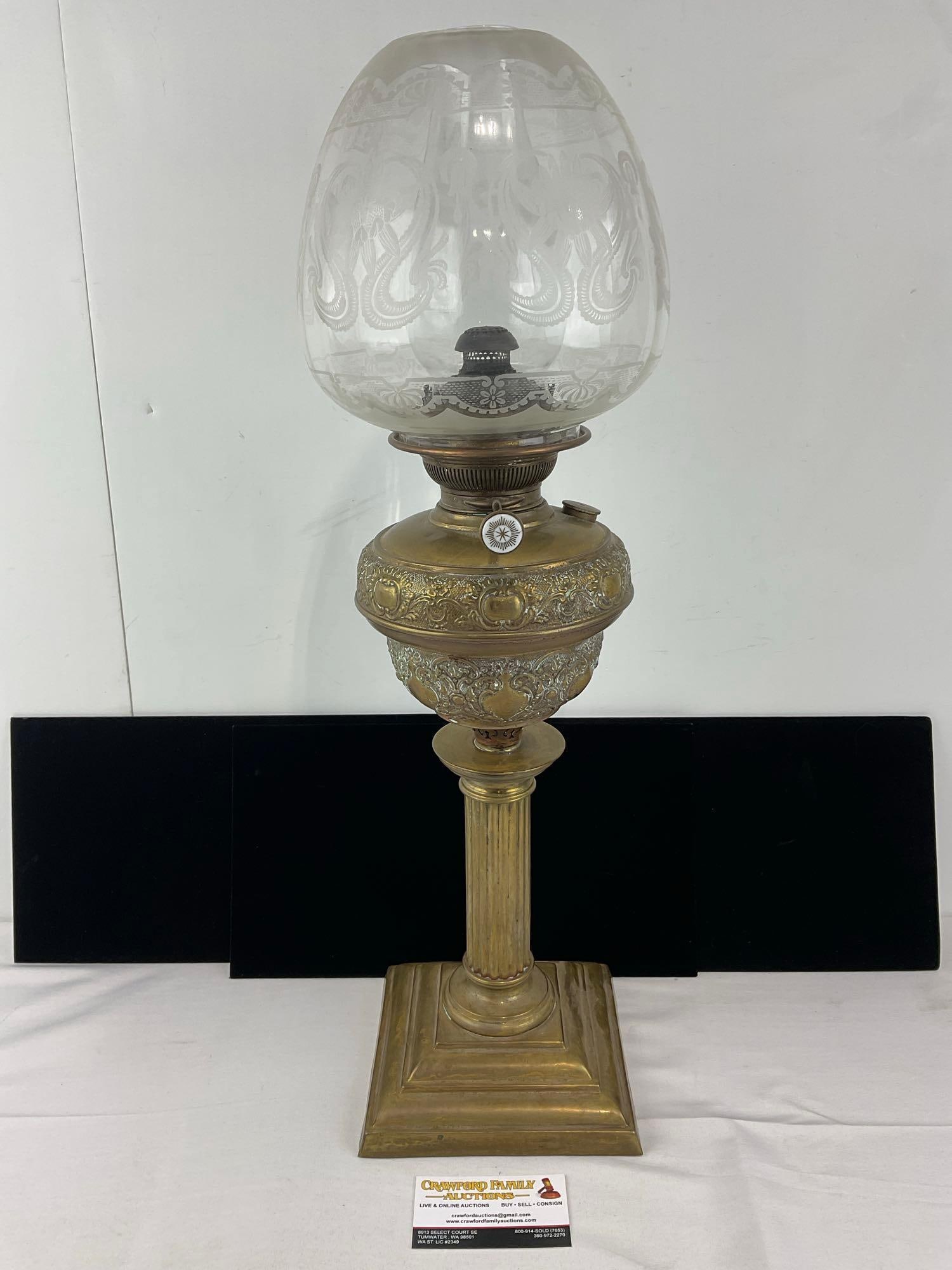 Antique German Oil Lamp, Brass Base, Embossed Font, w/Glass Chimney & Etched Globe, 26x9x9 in: See pics for condition. Measures approx 26h x 9w x 9d inches. E-6620