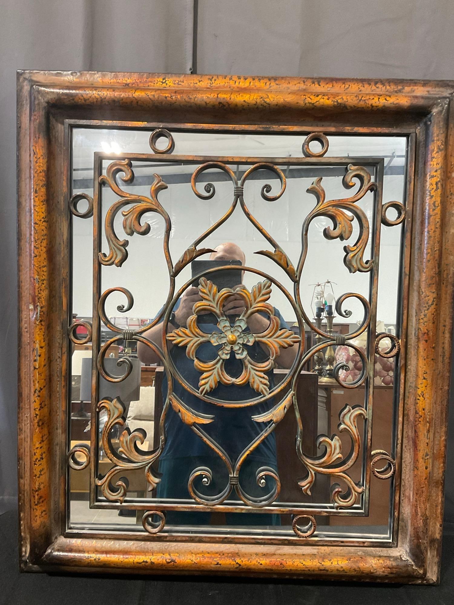 Wrought Iron style Decorative Mirror, Metal Frame, 41x35 inches: *No in-house shipping, fragile and/or oversized* See pics for condition. Measures approx 41h x 35w x 6d inches. E-6290 *Freight Required if shipped, Buyer Arranged/Responsibility*