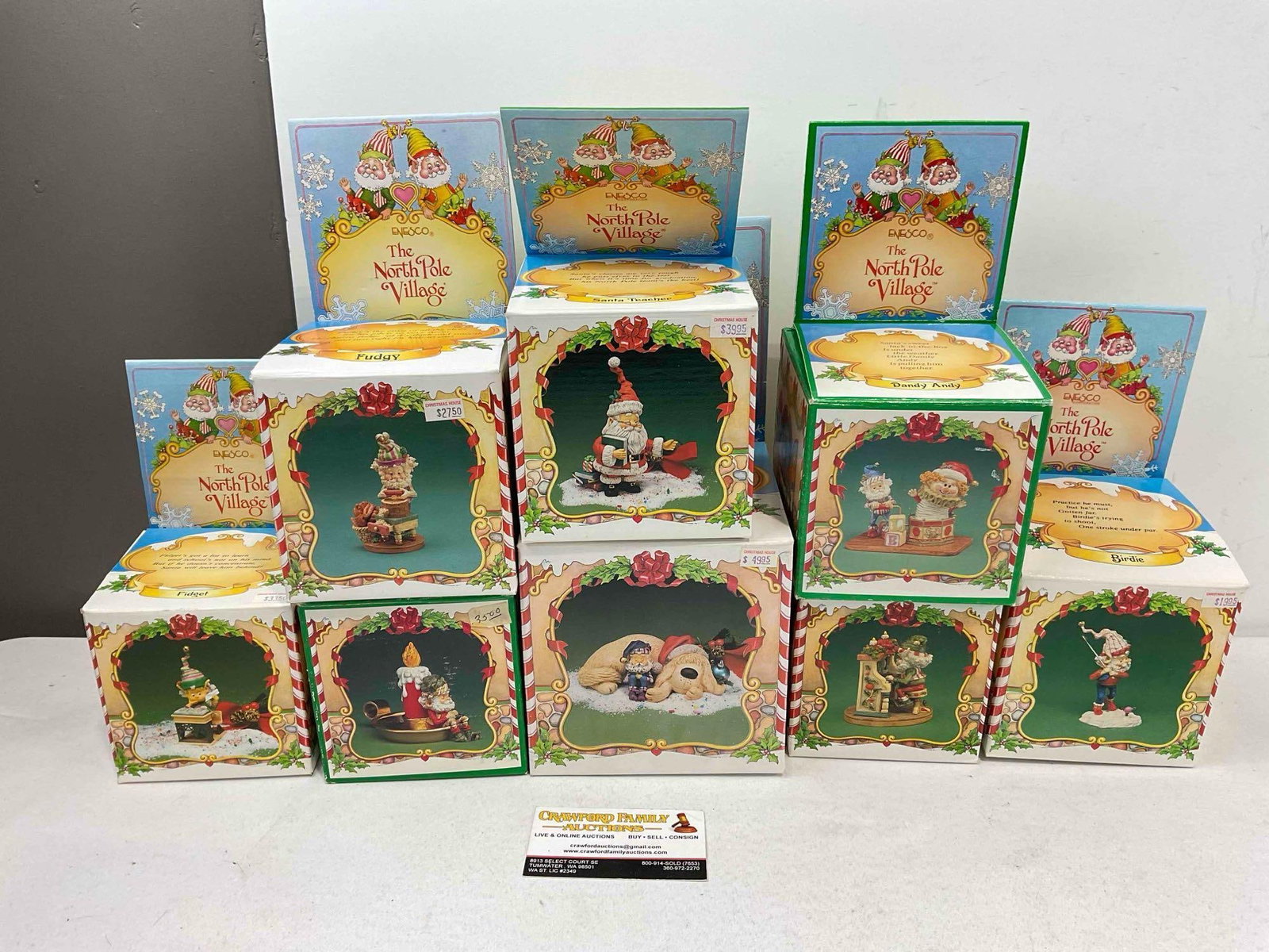 8 pcs Vintage ENESCO Composite The North Pole Village Decorative Christmas Figurines.in boxes: 8 pcs Vintage ENESCO Composite The North Pole Village Decorative Christmas Figurines. Pieces may have wear indicative of age and use, one is missing a piece, see photos for condition. Fits in