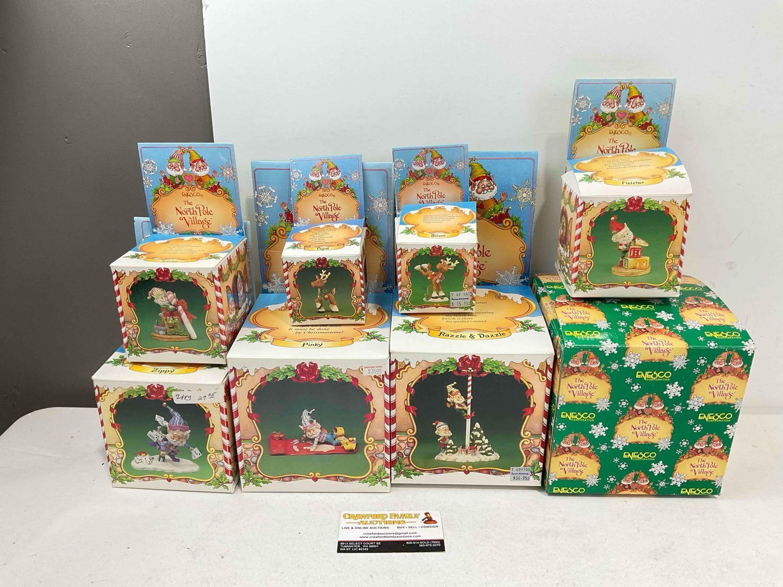 8 pcs Vintage ENESCO Composite The North Pole Village Christmas Decorative Figurines w/ boxes: 8 pcs Vintage ENESCO Composite The North Pole Village Christmas Decorative Figurines. Minor wear indicative of age and use, see photos for condition. Fits in a box measuring 12" x 12" x 12"