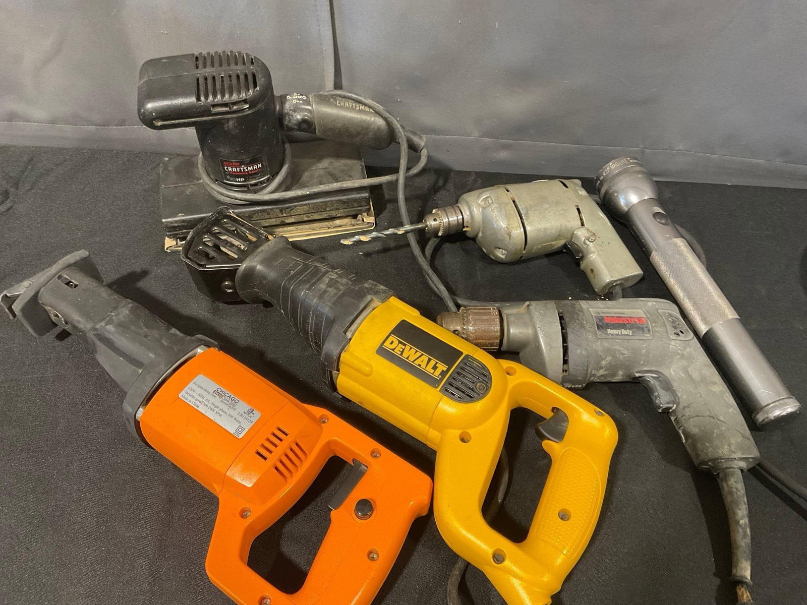 2x Reciprocating Saws Chicago 36595 & DeWalt DW304P, 2x Drills, Sears & Craftsman Sander: Untested by us, the consignor previously tested them. See pics for condition. Measures approx 12h x 25w x 18d inches. E-1554 *Oversized shipping may apply*