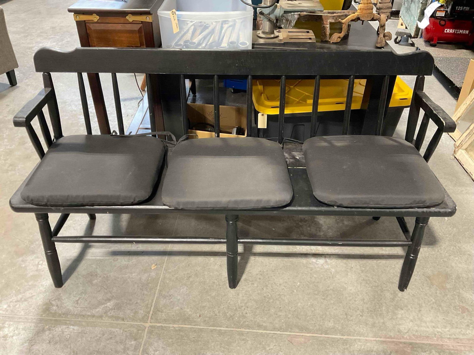 Modern Black Painted Wooden 3-Seat Garden Bench w/ Black Cushions. See pics.: Modern Black Painted Wooden 3-Seat Garden Bench w/ Black Cushions. Has been stored outside and has some rain marks, has stains and wear indicative of age and use, arms are a bit loose, looks to have