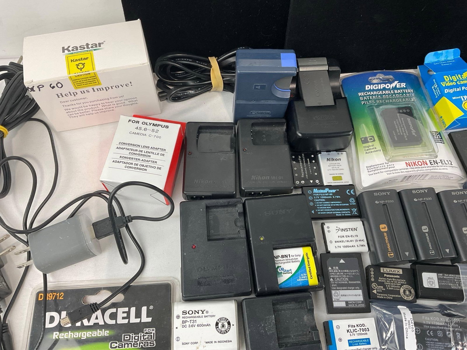 Assortment of Camera & Camcorder Batteries, Canon, Nikon, & offbrand pieces - 5