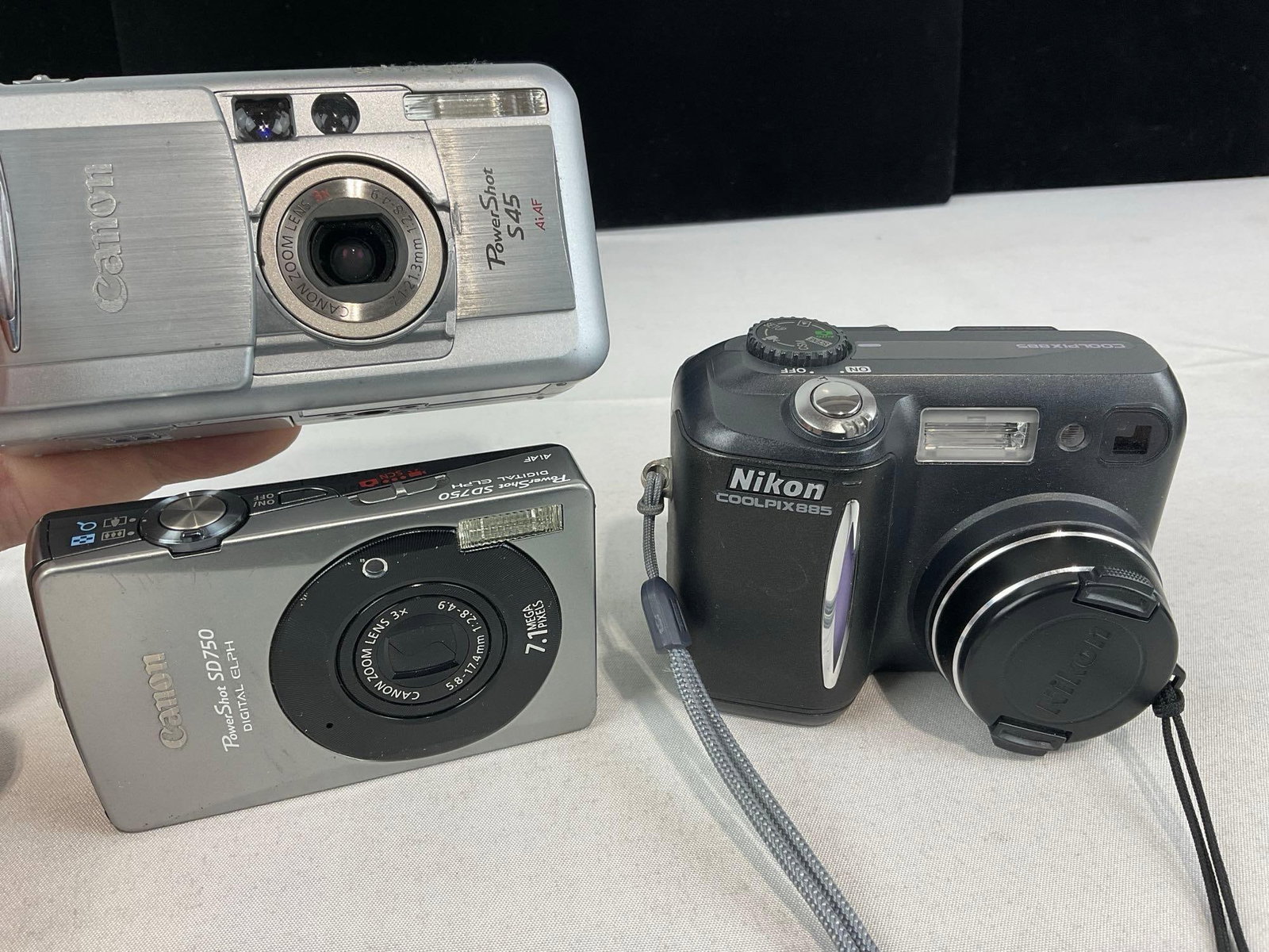Variety of Digital Cameras, several Nikon Coolpix, Samsung L77, Canon PowerShot SD750 & SD1000 - 11