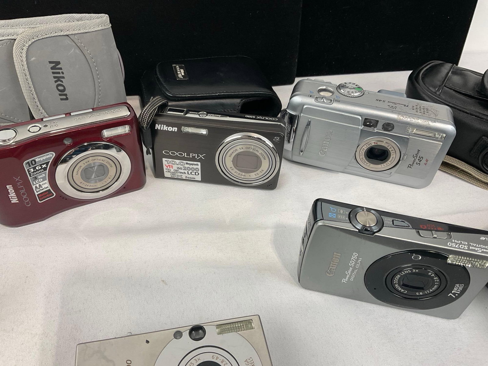 Variety of Digital Cameras, several Nikon Coolpix, Samsung L77, Canon PowerShot SD750 & SD1000 - 3