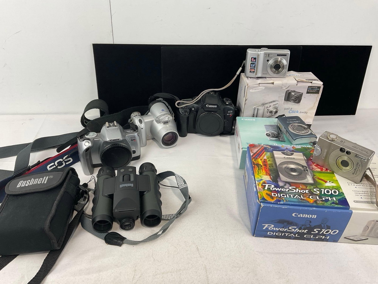 Bushnell ImageView 8X30 w/Digital Camera, 2x Canon EOS Film Cameras, Canon S630 & S100, Samsung S...: See pics for condition. Measures approx 11h x 16w x 13d inches. E-4320