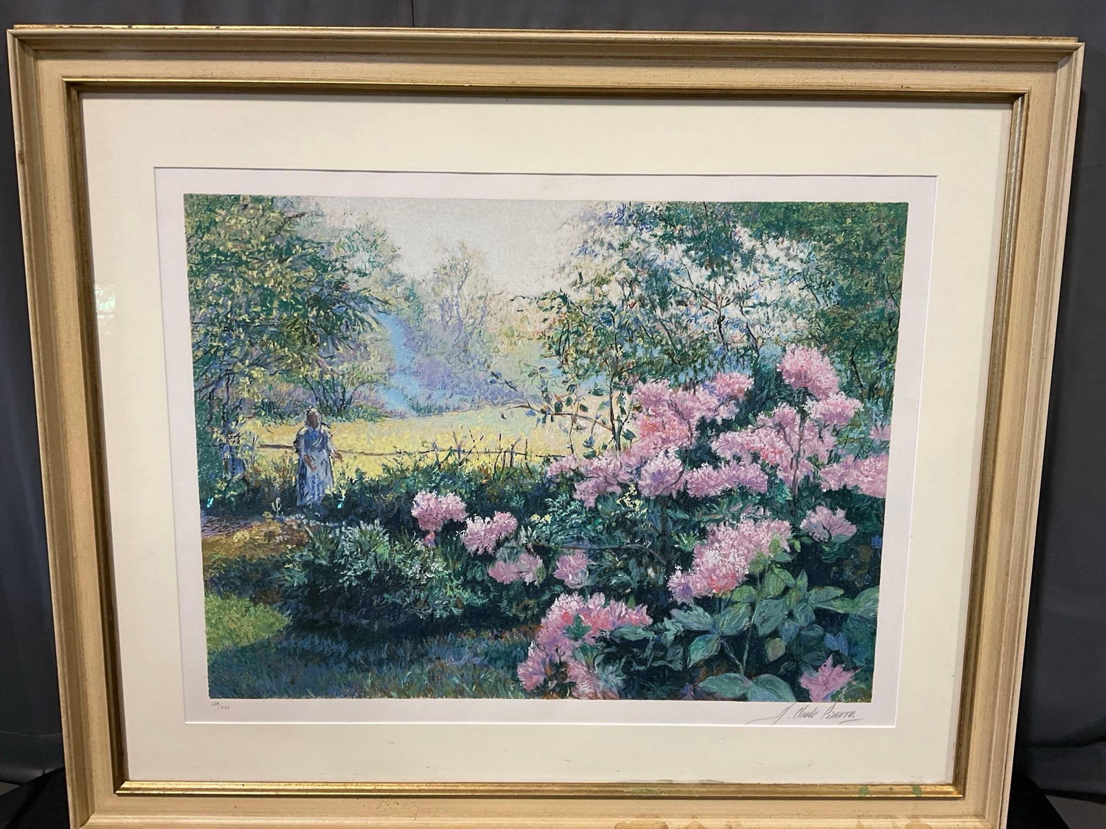 Framed Signed & #d 220/425 Litho titled Les Rhododendrons by Famous Claude Pissarro, 35x43 inches: About the artist Hugues Claude Pissarro (born November 9, 1935) is an accomplished French painter celebrated for carrying on the prestigious artistic legacy of his family. Named after his god
