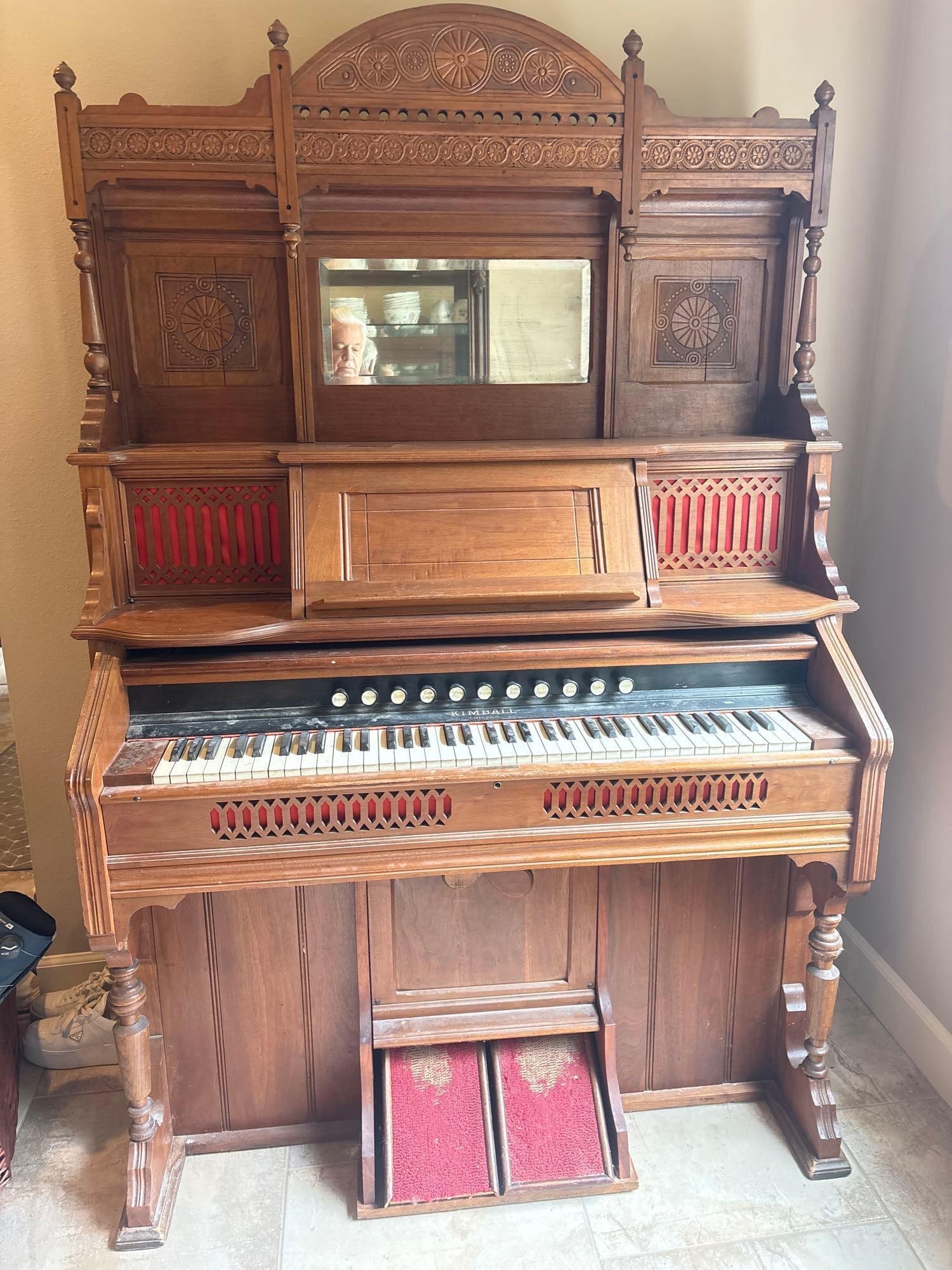 Antique Walnut / Oak Kimball pump Organ circa early 1900s 51 x 79 x 22: C-6710 Pump, organ Works probably need service Sold As is 51 inches wide X by approximately 79 inches tall 22 inches in width. has beveled mirror Wood is most likely walnut possibly oak