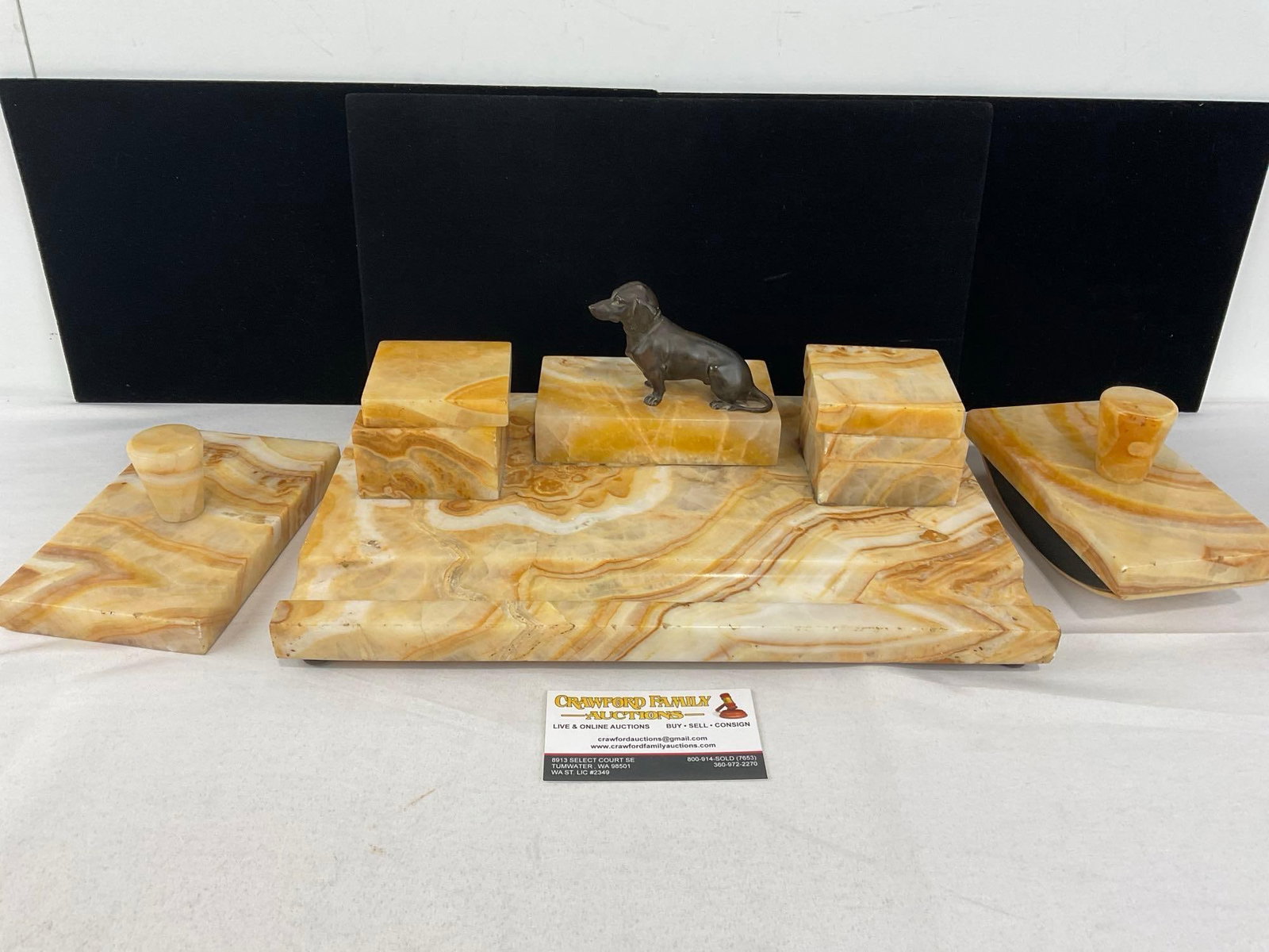 Antique Honey Onyx Stone Stationery Set w/Bronze Dog, Pair of Inkwells, Stamp & Rocking Stamp Set: Some imperfections, looks like a corner has been repaired. One inkwell has also been repaired. See pics for condition. Measures approx 5h x 14w x 10d inches. E-5370