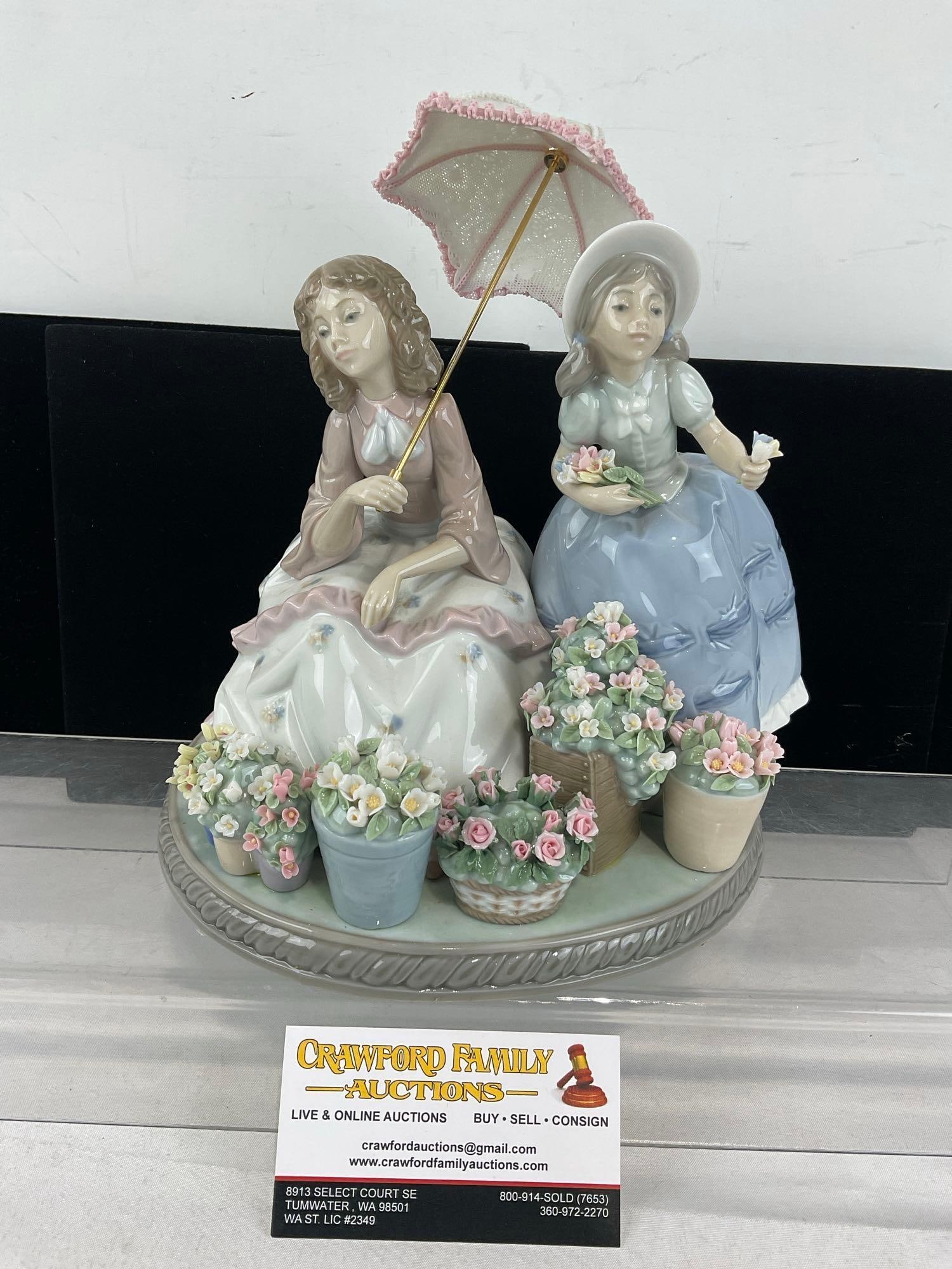 LLADRO Glazed Porcelain Figurine in box, #05537 Flowers For Sale, roughly 10x9x7 inches: Last historical retail price was 1550 dollars, issued in 1989, & retired in 2000. Comes with the fragile bisque porcelain umbrella piece w/brass screw on handle. See pics for condition. The box