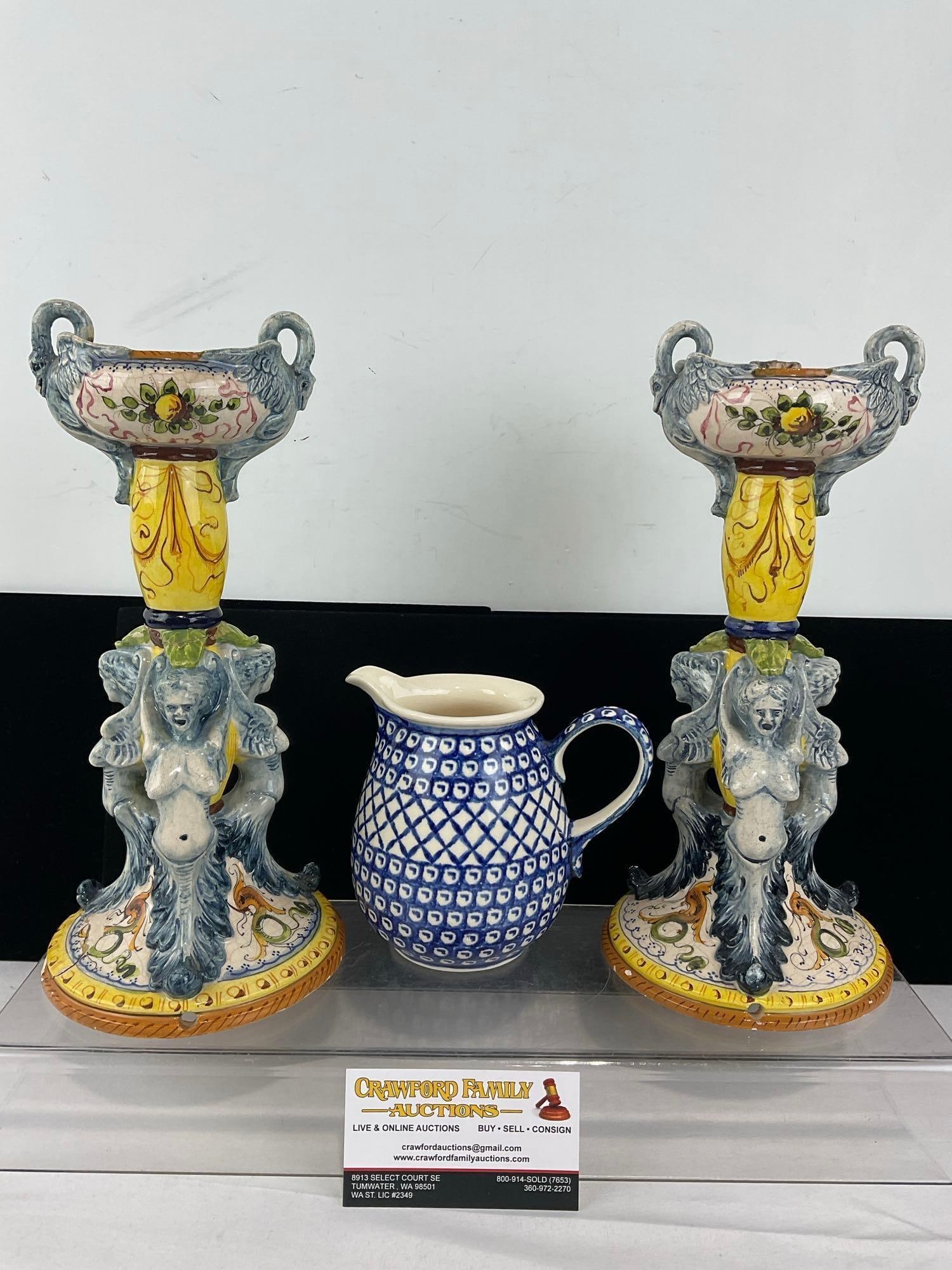 Pair of Italian Majolica Ceramic Pedestal Candle Holders, some wear, & Polish Pottery Creamer: Some cracking, and some chipping along the bottom rim of the candleholders & on the holders themselves. Also a previous repair of the stem of one. See pics for condition. Measures approx 8h x 9w
