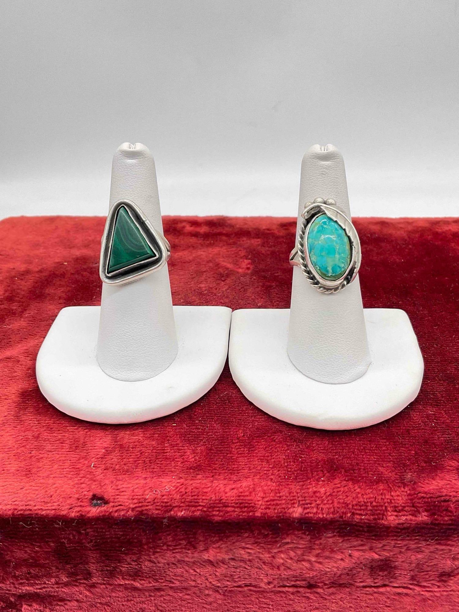 2 pcs Sterling Silver Southwestern Style Rings w/ Malachite & Turquoise Toned Stones.: 2 pcs Sterling Silver Southwestern Style Rings w/ Malachite & Turquoise Toned Stones. Malachite stone is loose, could be fixed. Malachite ring is signed JM. Assorted sizes. DM-1554