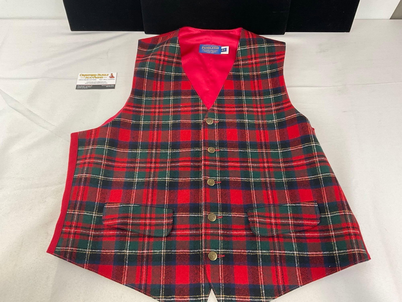 Pendleton Red/Green Tartan Plaid Vest w/bright red liner, size 44, brass buttons: See pics for condition. Measures approx 24-28 inches from collar to bottom edge, and approx 18 inches from shoulder to shoulder. E-6290