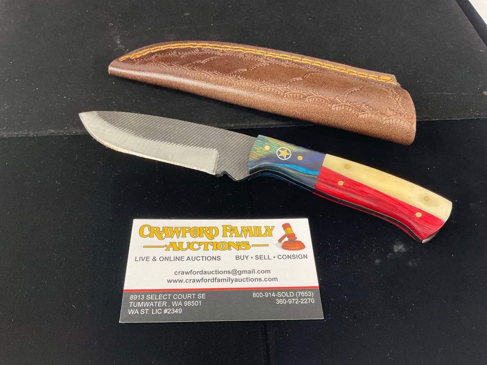File Steel Knife w/American style Red/White/Blue Tinted Wood Handle, & Leather Sheath: All these knives are from the same collection. See pics for condition. Blade measures approx 4 inches. Measures approx 10h x 3w x 2d inches. E-3440