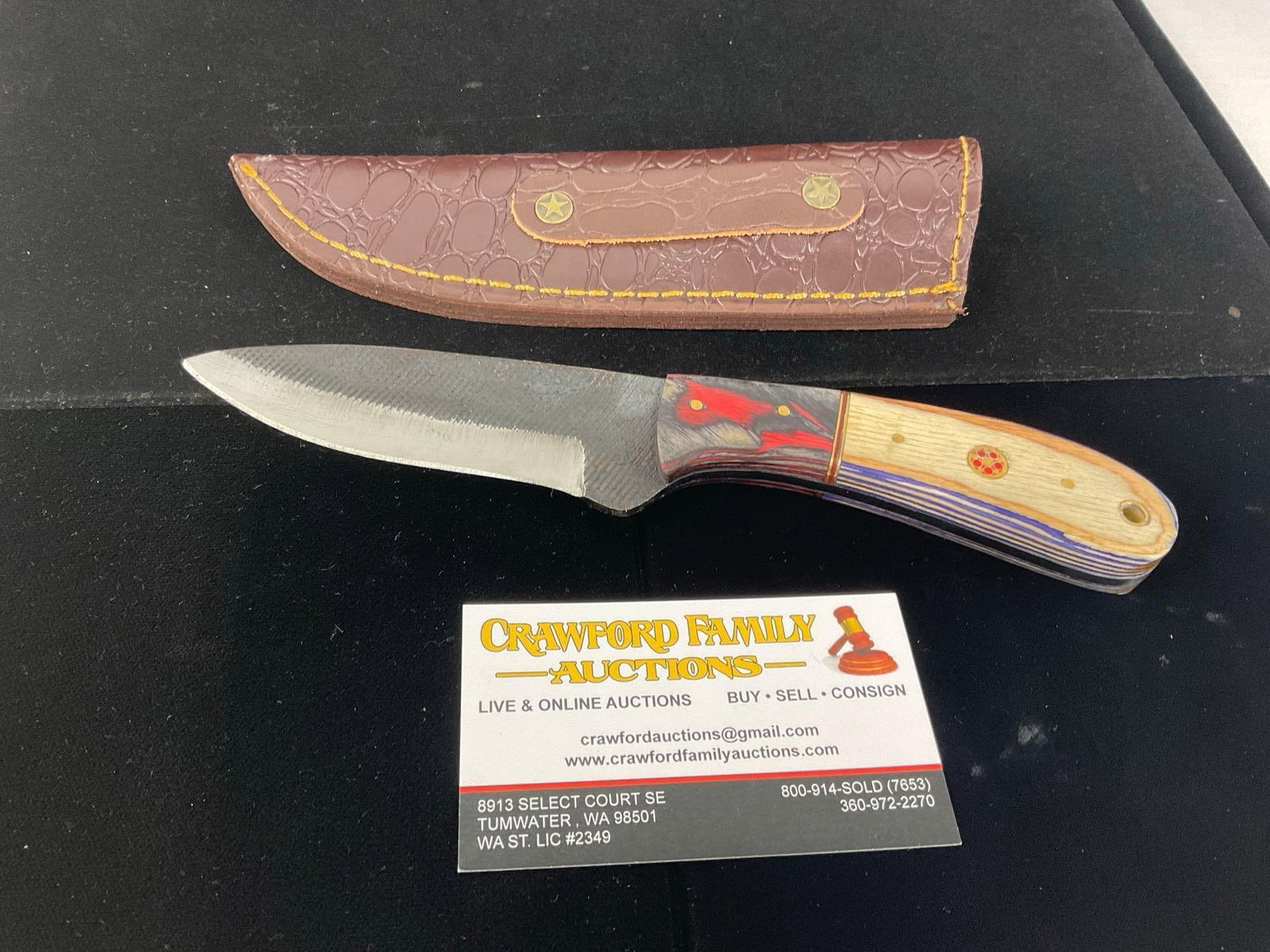File Steel Knife w/Tinted Wood Handle, Black/Red & White/Blue & Leather Sheath: All these knives are from the same collection. See pics for condition. Blade measures approx 4 inches. Measures approx 10h x 3w x 2d inches. E-3440
