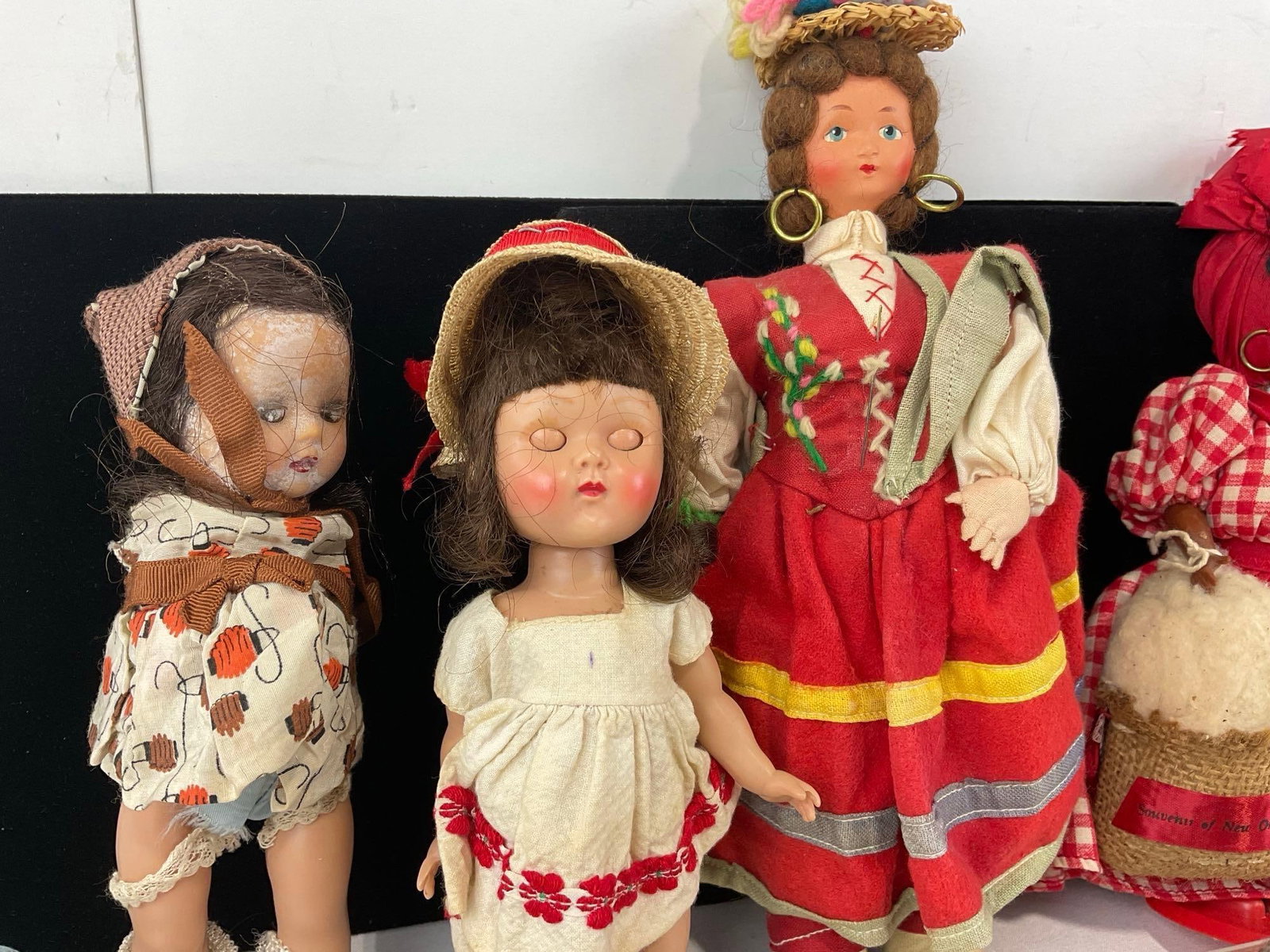 6 Folk Dolls, Magis Roma Italian Doll, Praline Lady, NOLA souvenir, SA Peasant Doll, & some clothes - 4