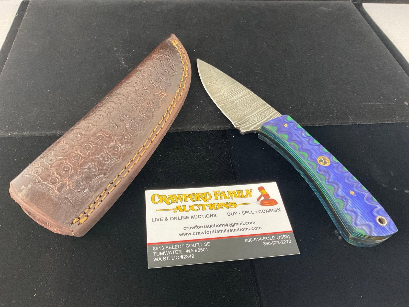 Damascus Steel Knife w/Blue/Green Tinted Wood Handle & Leather Sheath: All these knives are from the same collection. See pics for condition. Blade measures approx 3.5 inches. Measures approx 10h x 4w x 2d inches. E-3440