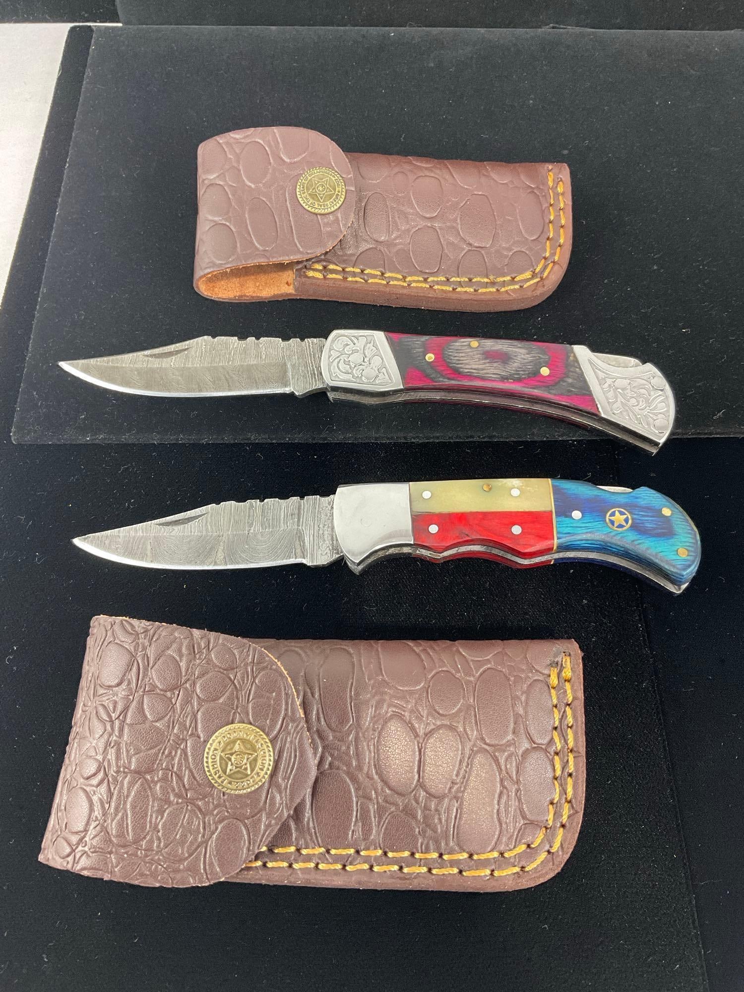 Pair of Handmade Folding Damascus Steel Knives w/Tinted Wood Handles & Leather Sheaths - 2