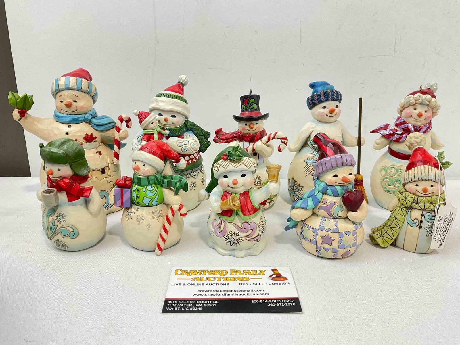 10 pcs Jim Shore Heartwood Creek Composite Christmas Snowman Decorative Figurines.: 10 pcs Jim Shore Heartwood Creek Composite Christmas Snowman Decorative Figurines. Minor wear indicative of age and use, see photos for condition. Fits in box measuring 11" x 9" x 6" DM-6670