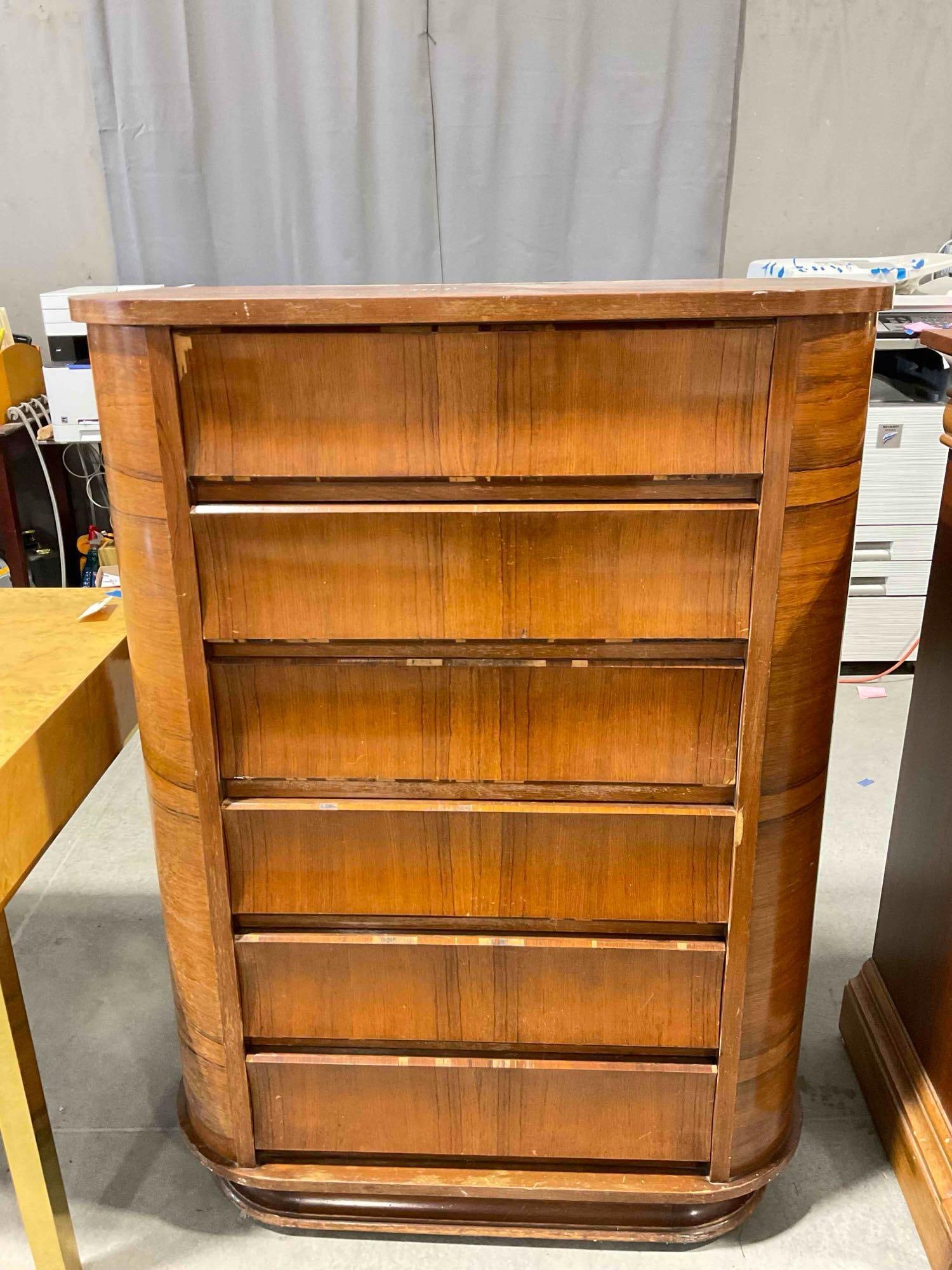 Vintage Saginaw Furni. Co. Art Deco Waterfall Style Walnut Veneer Tallboy Dresser w/ 6 Drawers.: Vintage Saginaw Furni. Co. Art Deco Waterfall Style Walnut Veneer Tallboy Dresser w/ 6 Drawers. Piece is in fair condition and has wear indicative of age and use, missing some pieces of tri