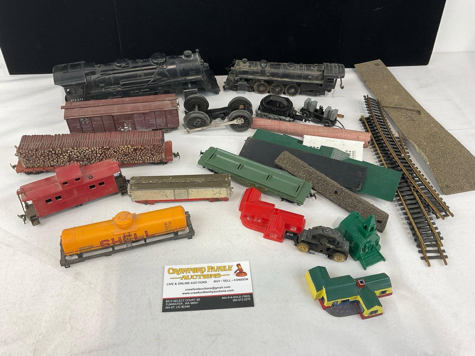 Vintage Train Pieces, Cars, some wear, Shell Oil Tanker, looks to be HO & O Scale: Some broken pieces, a few without wheels, some small house model pieces. See pics for condition. Measures approx 7h x 15w x 7d inches. E-6610