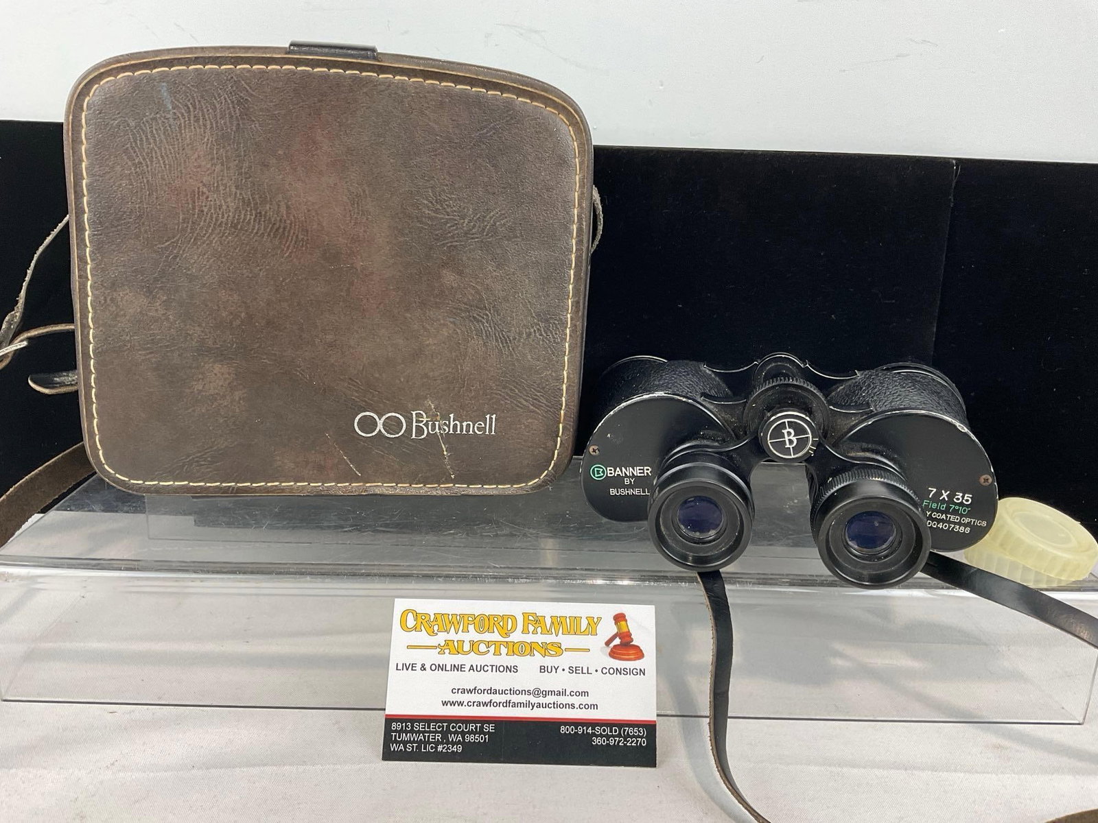 Banner by Bushnell 7x35 Fully Coated Optics Binoculars w/Leather Case: Appears to be in good shape. The piece measures approx 8h x 8w x 4d inches. See pics. E-6260