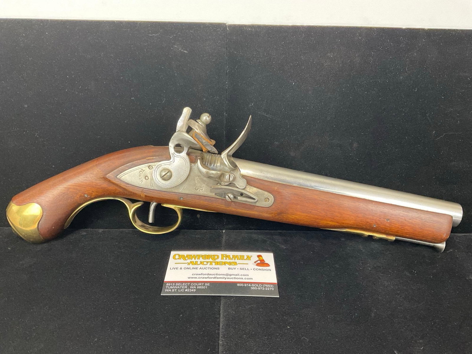 Modern Tower Black Powder Flintlock Pistol, 9 inch barrel, SN:6097: Appears to be in good shape. The barrel measures approx 9 inches. In total measures approx 16h x 6w x 4d inches. See pics. E-5360