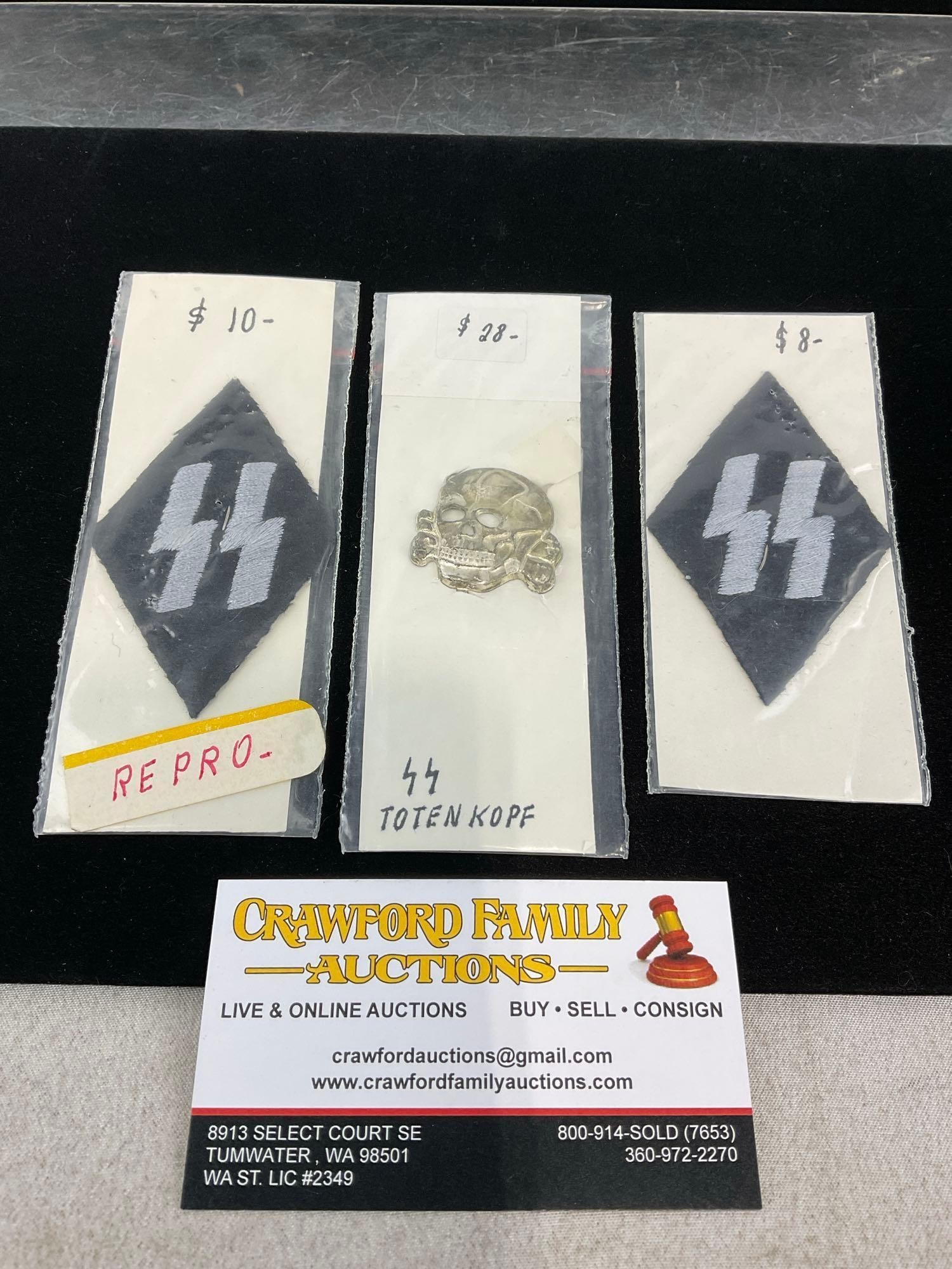 WWII German Third Reich Totenkopf Hat Badge & Pair of SS Diamond Shaped Patches, 1 marked repro: Unclear whether either or both of the patches are genuine. All from the same collection. Appears to be in good shape. The piece measures approx 5h x 3w x 2d inches. See pics. E-414
