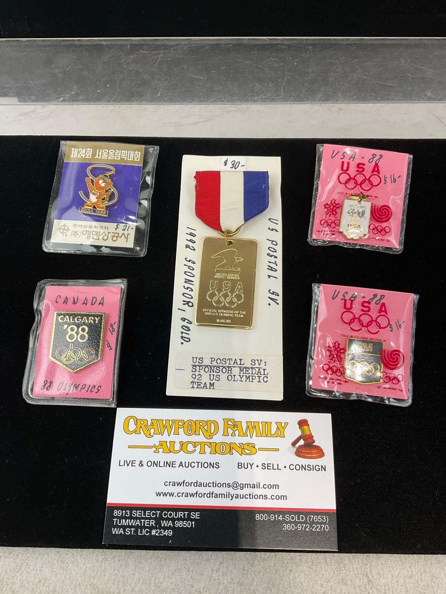 Olympics 1992 US Team Medal, 4 enamel Pins, Calgary 1988, Seoul 1988, & 2 more 1988 pieces: Appears to be in good shape. The piece measures approx 5h x 3w x 2d inches. See pics. E-414