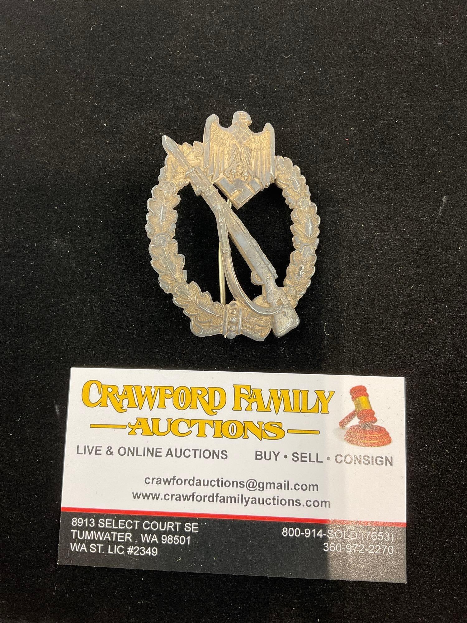 World War II German Third Reich, Infantry Assault Badge, Silver Grade, Oval Oak leaf w/Eagle & Ri...: Appears to be in good shape. The piece measures approx 3h x 2w x 2d inches. See pics. E-6160