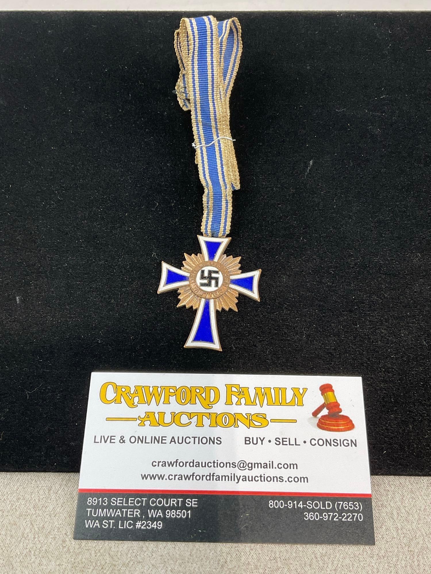 German Third Reich Cross of Honour of the German Mother, Gold Class, Cobalted w/gold tone metal: Appears to be in good shape. The piece measures approx 3h x 3w x 2d inches. See pics. E-6160
