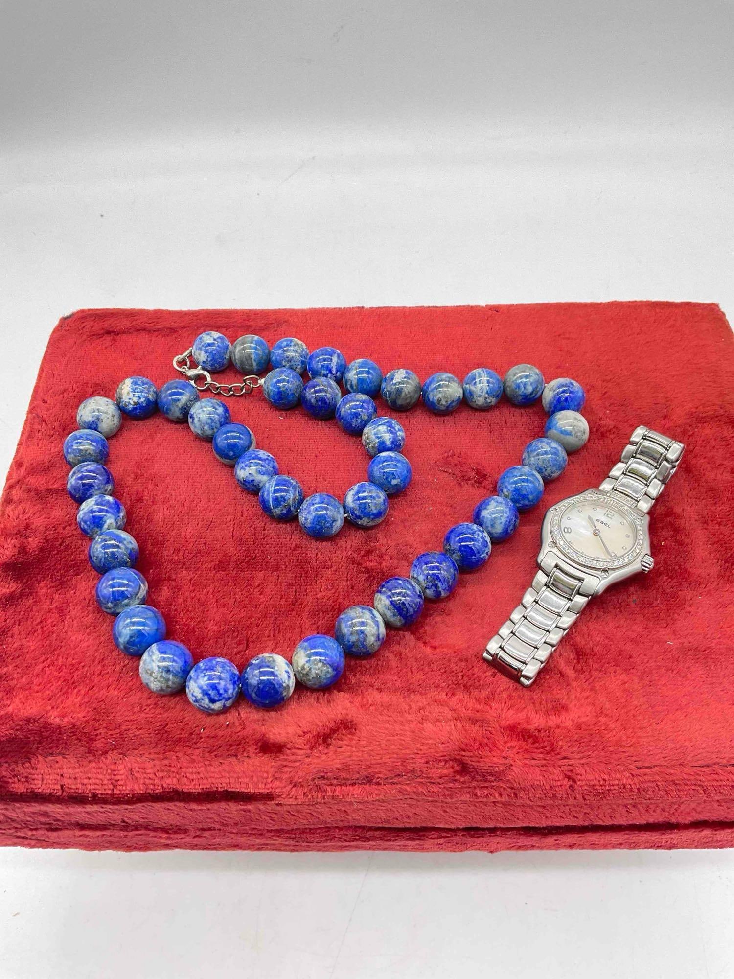 Rich Blue Lapis Lazuli 20" Bead Necklace & Ebel Ladies' Watch w/ Mother of Pearl Face. See pics.: Rich Blue Lapis Lazuli 20" Bead Necklace & Ebel Ladies' Watch w/ Mother of Pearl Face. all watches are sold as is and may require battery/maintenance. DM-5010